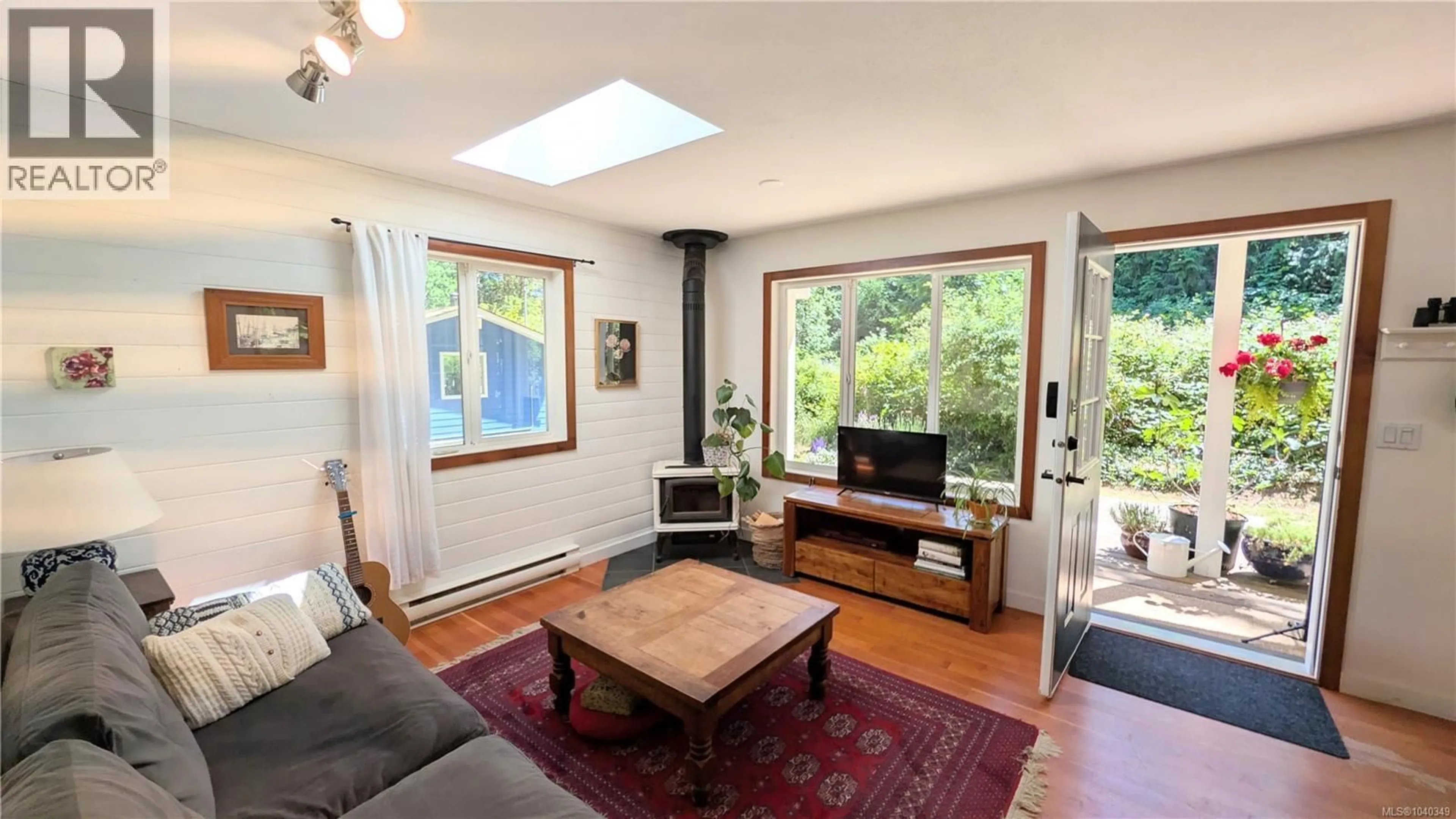 Living room with furniture, wood/laminate floor for 3185 SILVA BAY ROAD, Gabriola Island British Columbia V0R1X7
