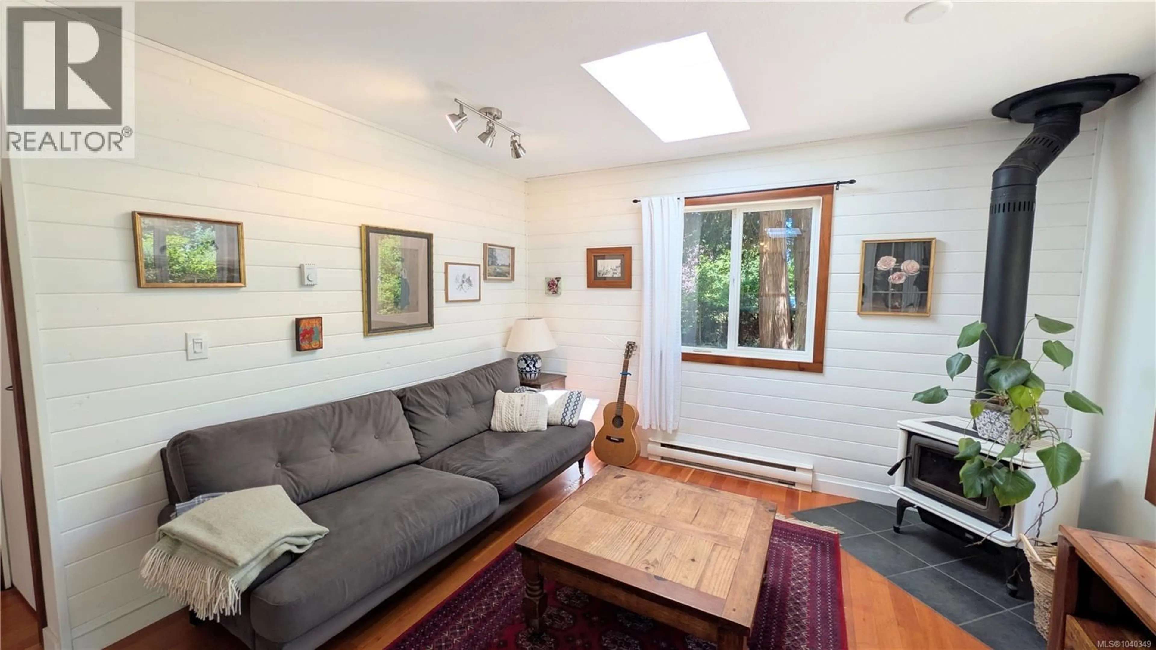 Living room with furniture, wood/laminate floor for 3185 SILVA BAY ROAD, Gabriola Island British Columbia V0R1X7