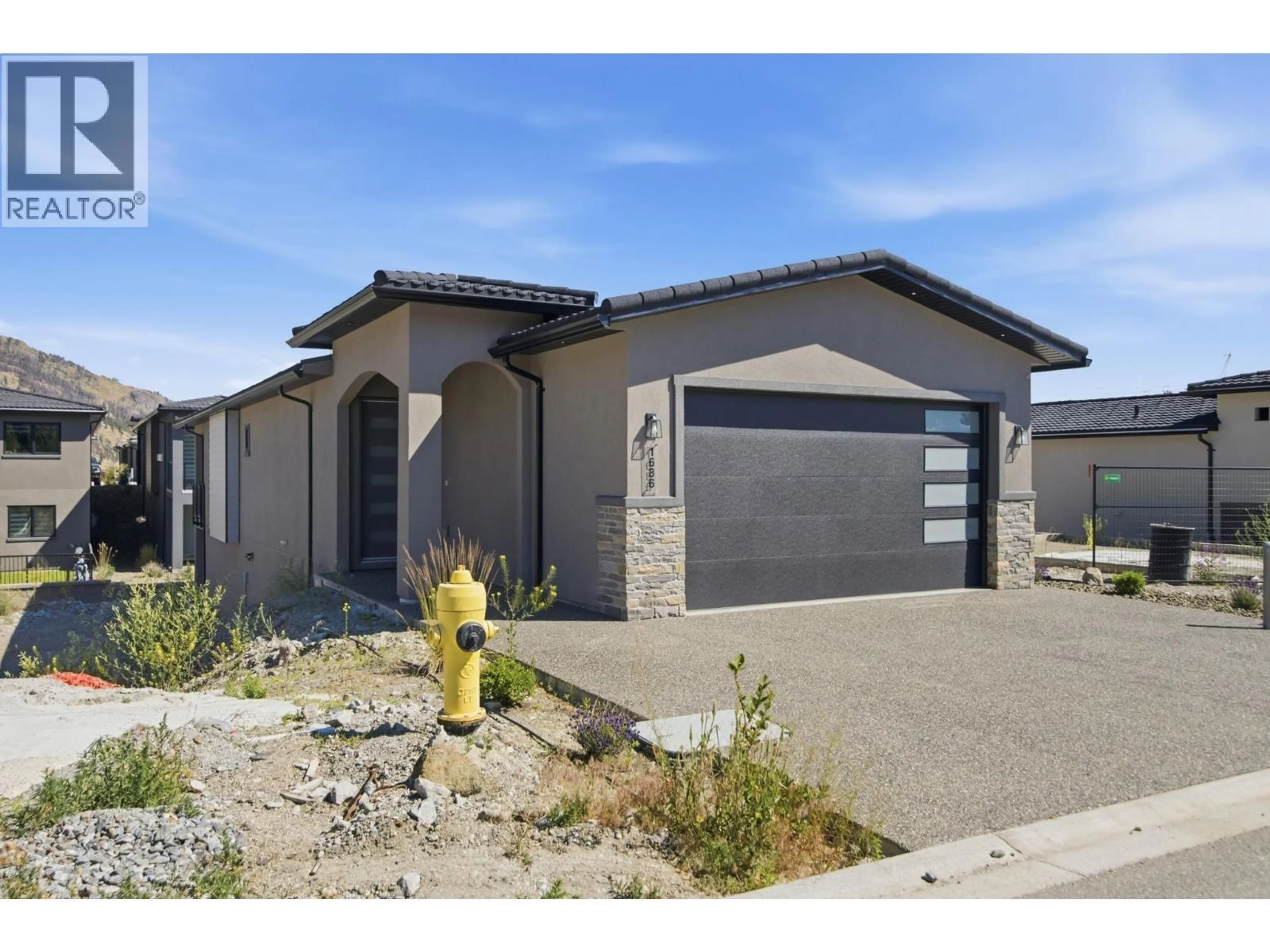 Home with brick exterior material, street for 1686 HARBOUR VIEW CRESCENT, West Kelowna British Columbia V1Z4E1