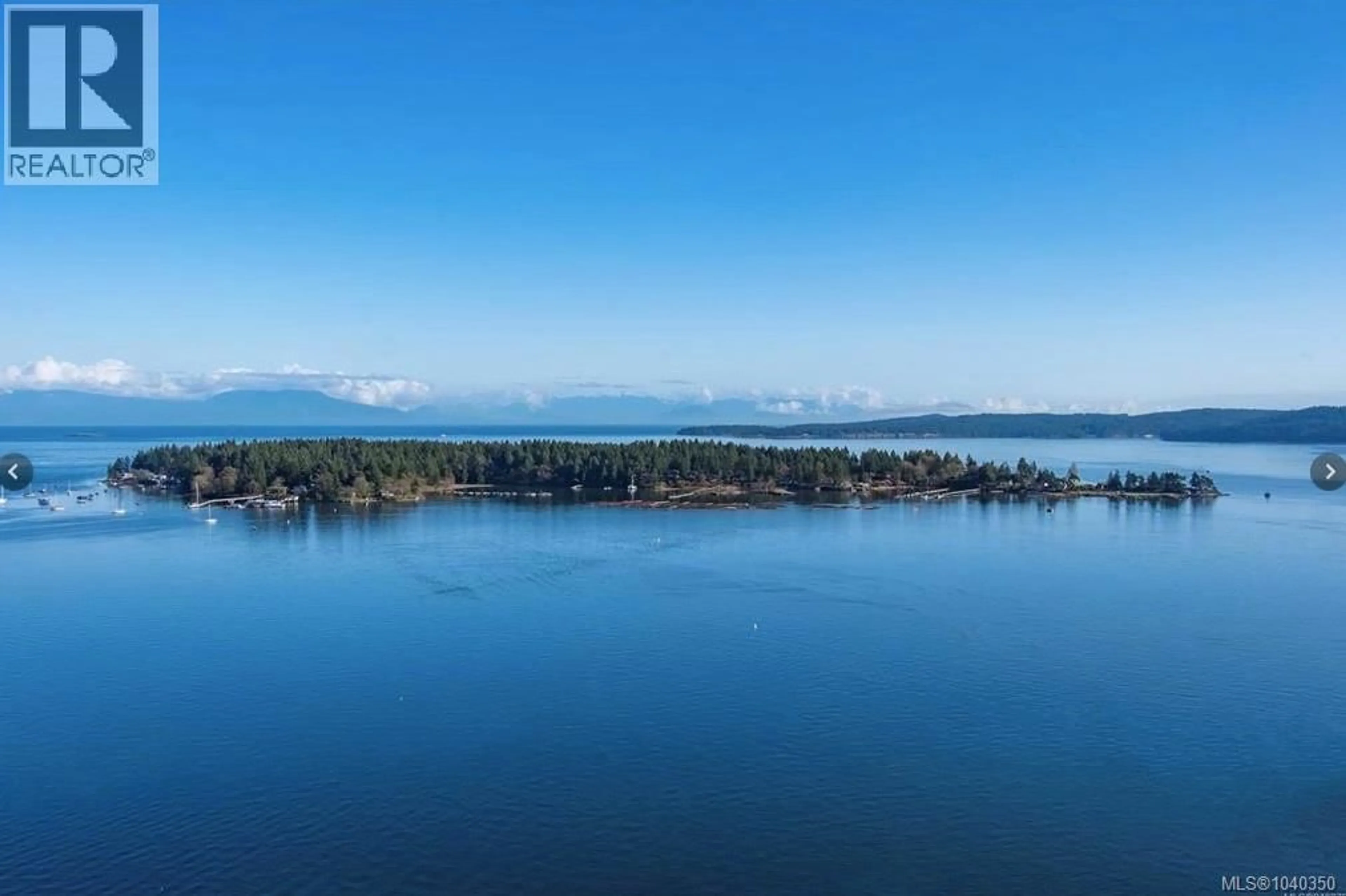 A pic from outside/outdoor area/front of a property/back of a property/a pic from drone, water/lake/river/ocean view for 19 CAPTAIN MORGANS BOULEVARD, Protection Island British Columbia V9R6R1