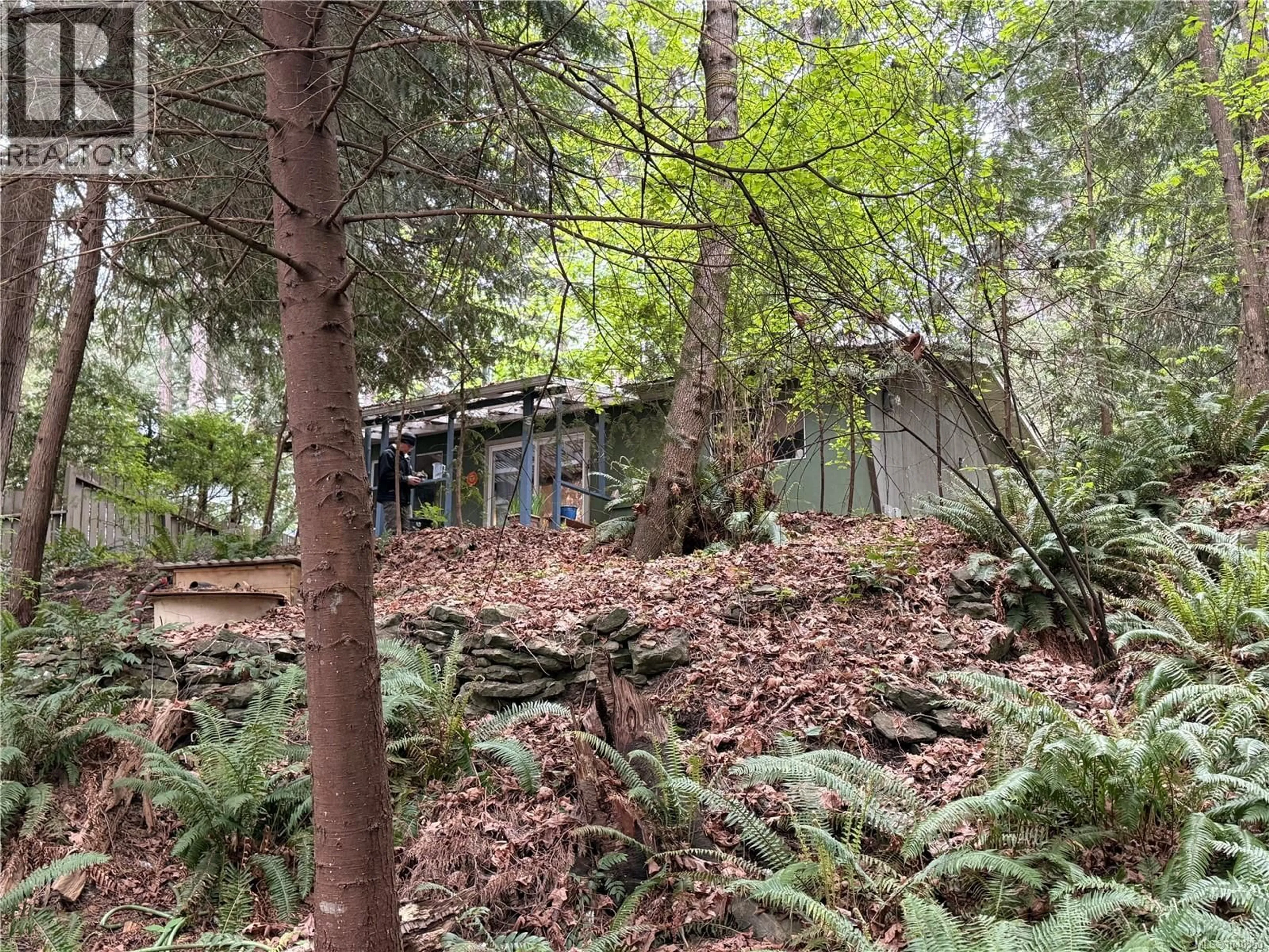 A pic from outside/outdoor area/front of a property/back of a property/a pic from drone, forest/trees view for 19 CAPTAIN MORGANS BOULEVARD, Protection Island British Columbia V9R6R1