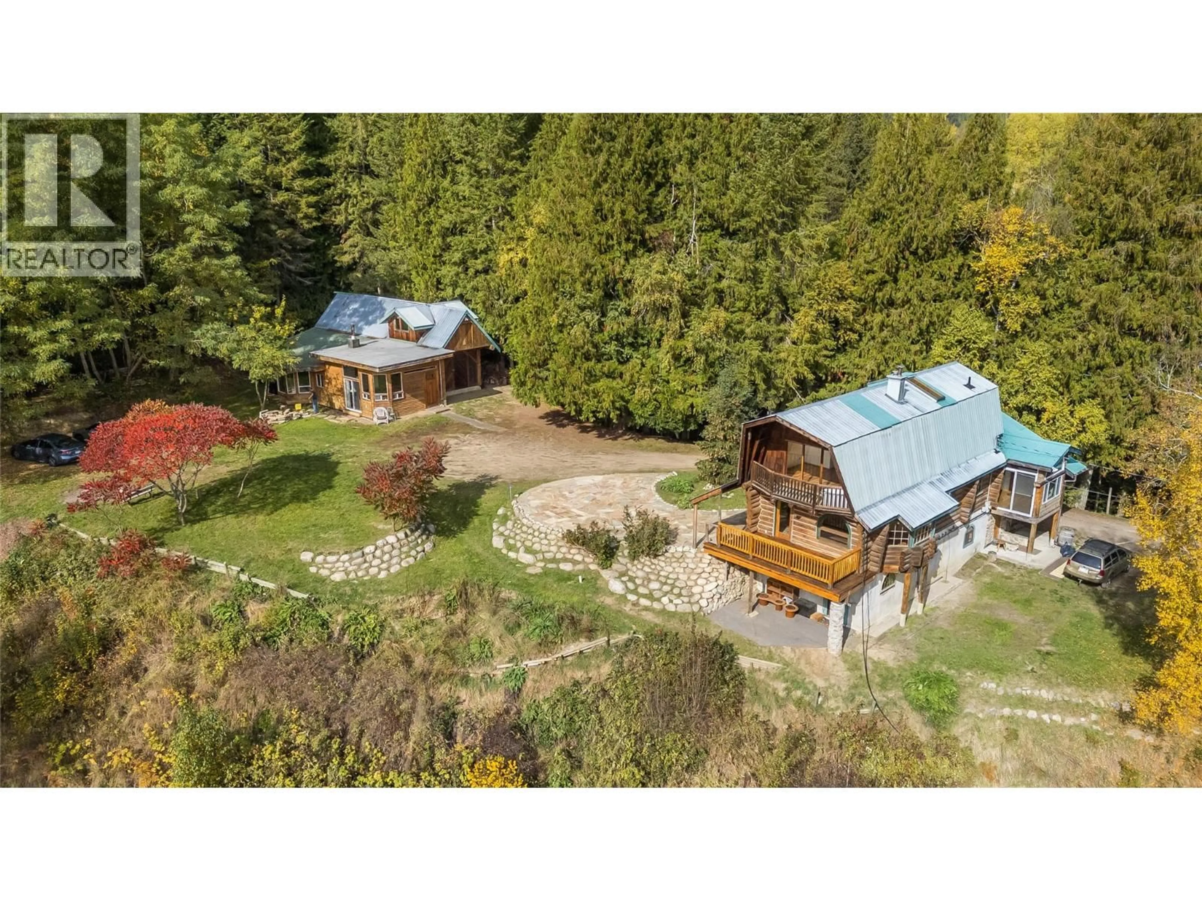 A pic from outside/outdoor area/front of a property/back of a property/a pic from drone, forest/trees view for 6238 YOUNGS ROAD, Winlaw British Columbia V0G2J0