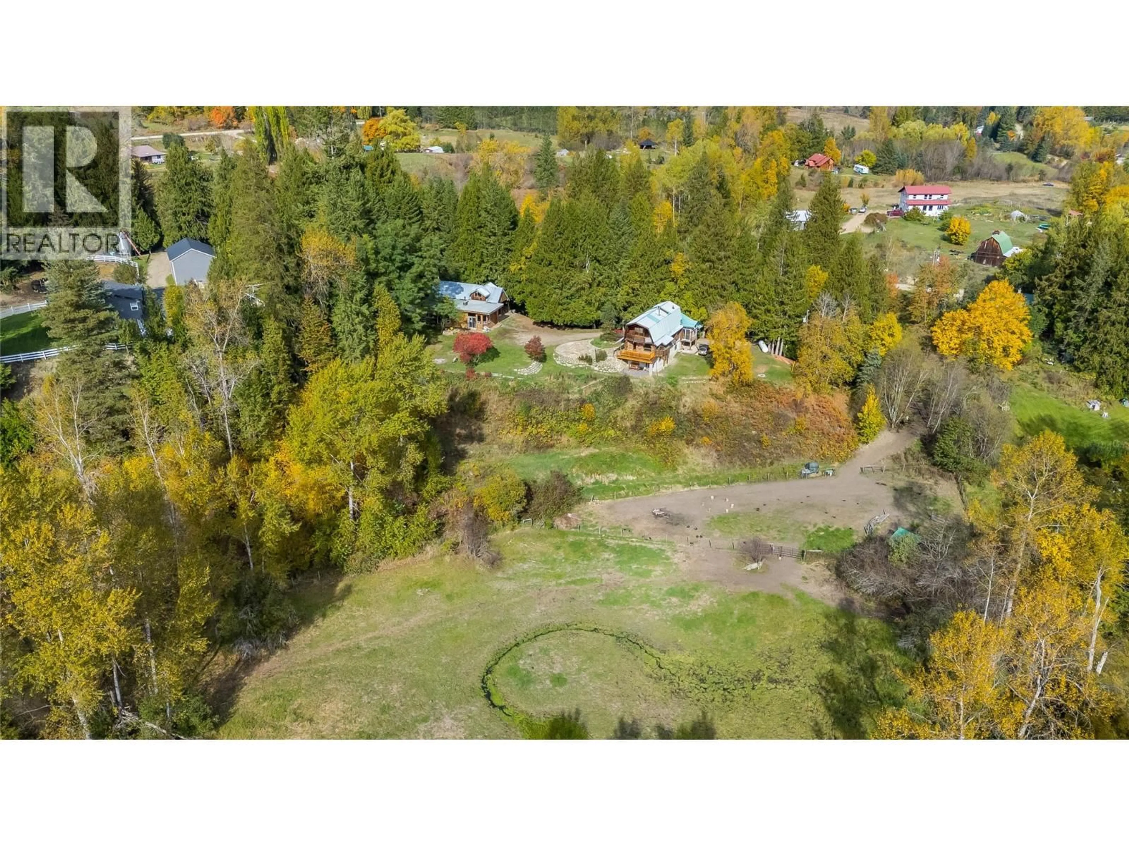 A pic from outside/outdoor area/front of a property/back of a property/a pic from drone, forest/trees view for 6238 YOUNGS ROAD, Winlaw British Columbia V0G2J0