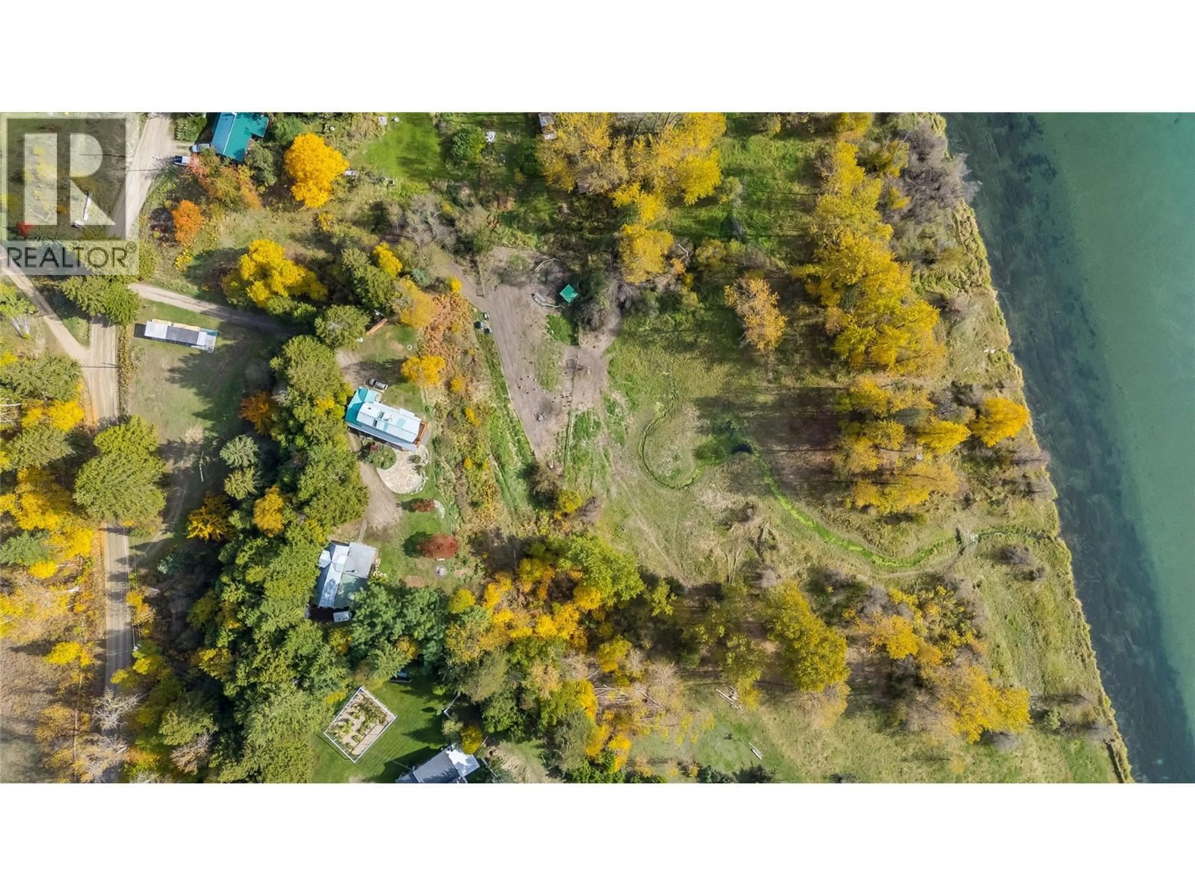 A pic from outside/outdoor area/front of a property/back of a property/a pic from drone, forest/trees view for 6238 YOUNGS ROAD, Winlaw British Columbia V0G2J0