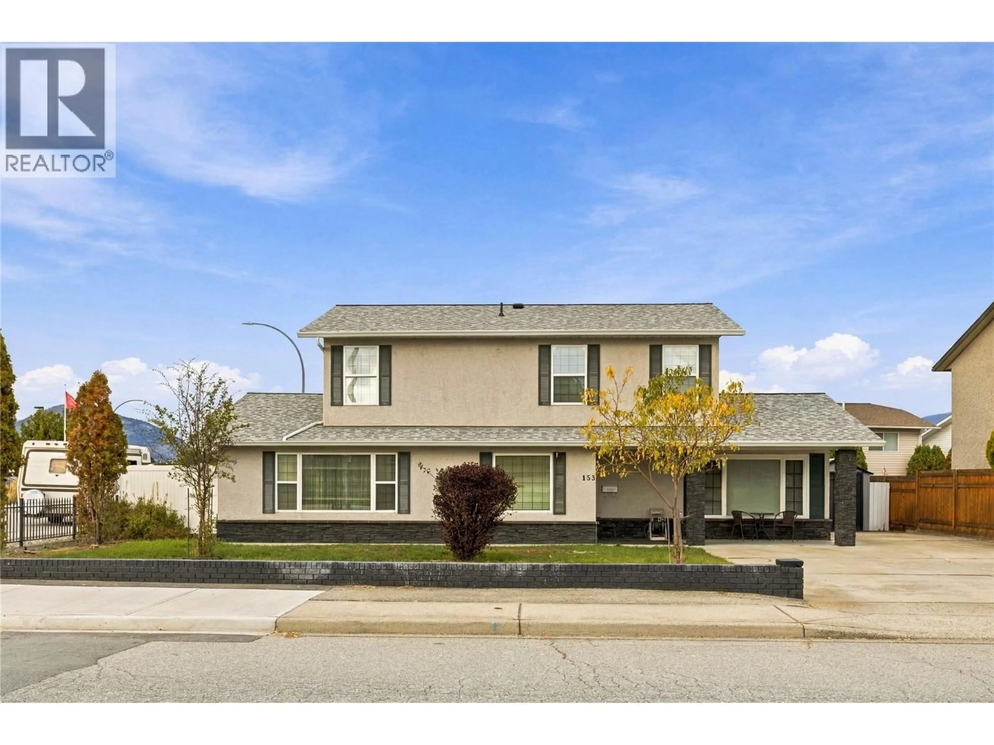 Home with vinyl exterior material, street for 153 YORKTON AVENUE, Penticton British Columbia V2A3V3
