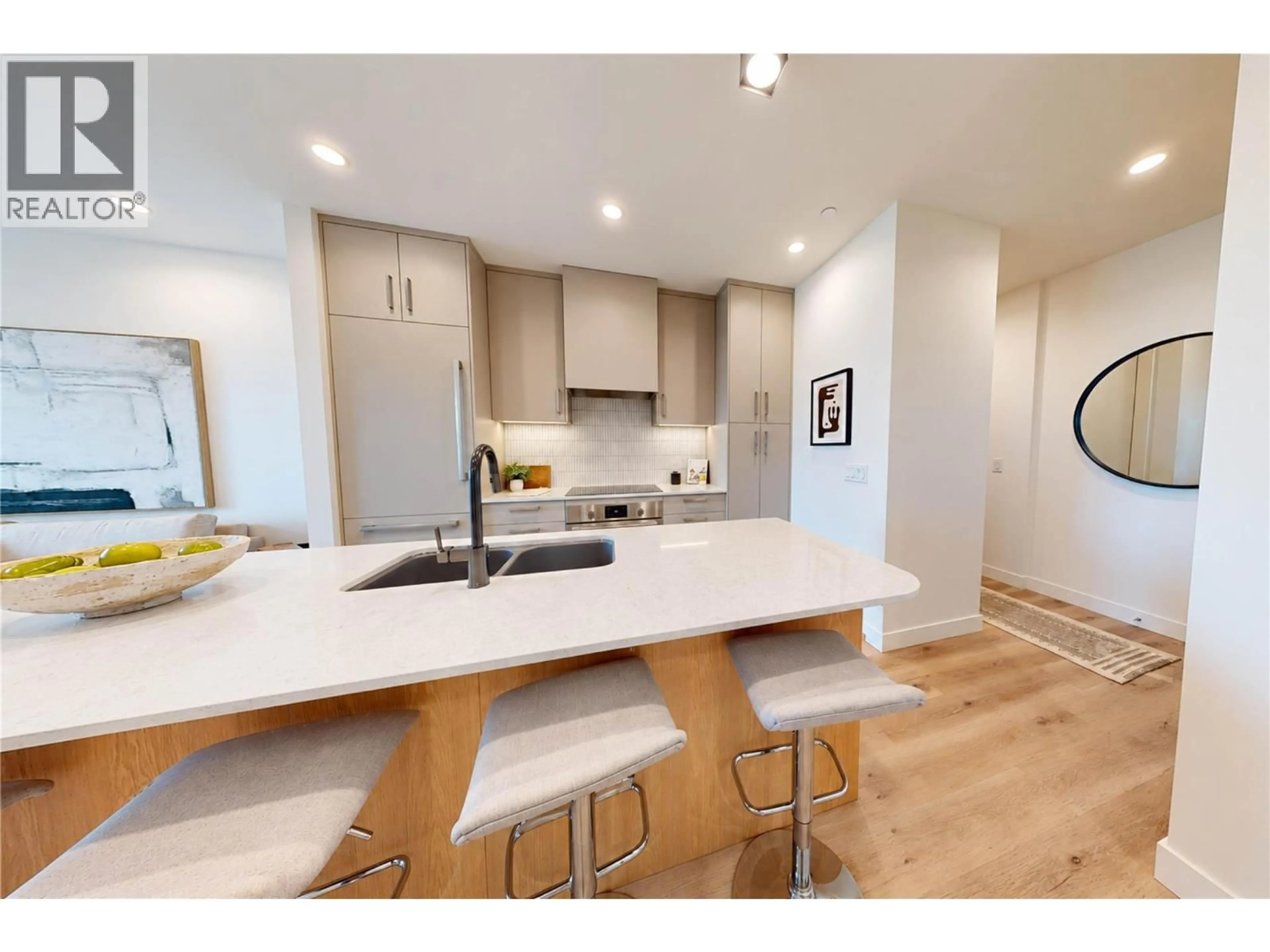Open concept kitchen, wood/laminate floor for 804 - 3300 LAKESHORE ROAD, Kelowna British Columbia V1W0J9