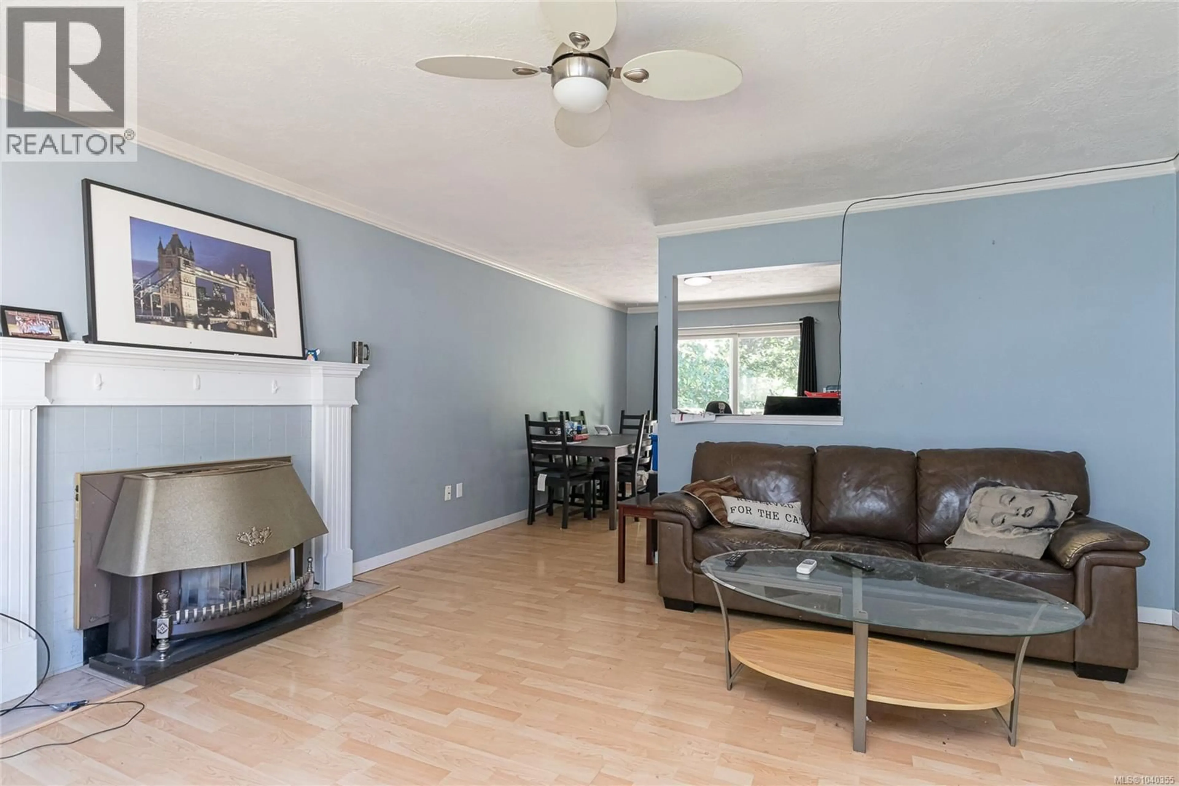 Living room with furniture, wood/laminate floor for 2818 MEADOWVIEW ROAD, Shawnigan Lake British Columbia V8H2H5