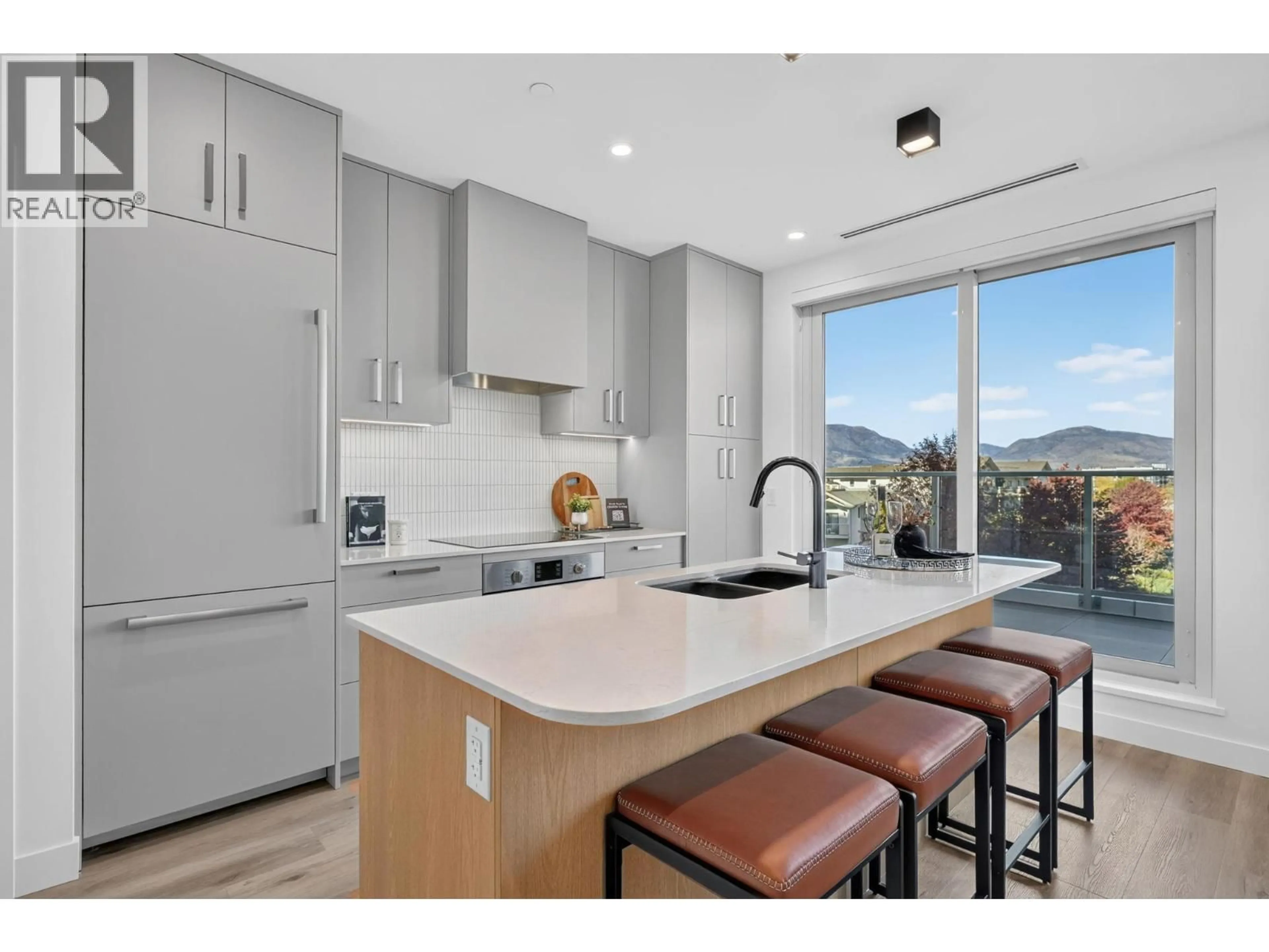 Open concept kitchen, ceramic/tile floor for 406 - 3300 LAKESHORE ROAD, Kelowna British Columbia V1W0J9
