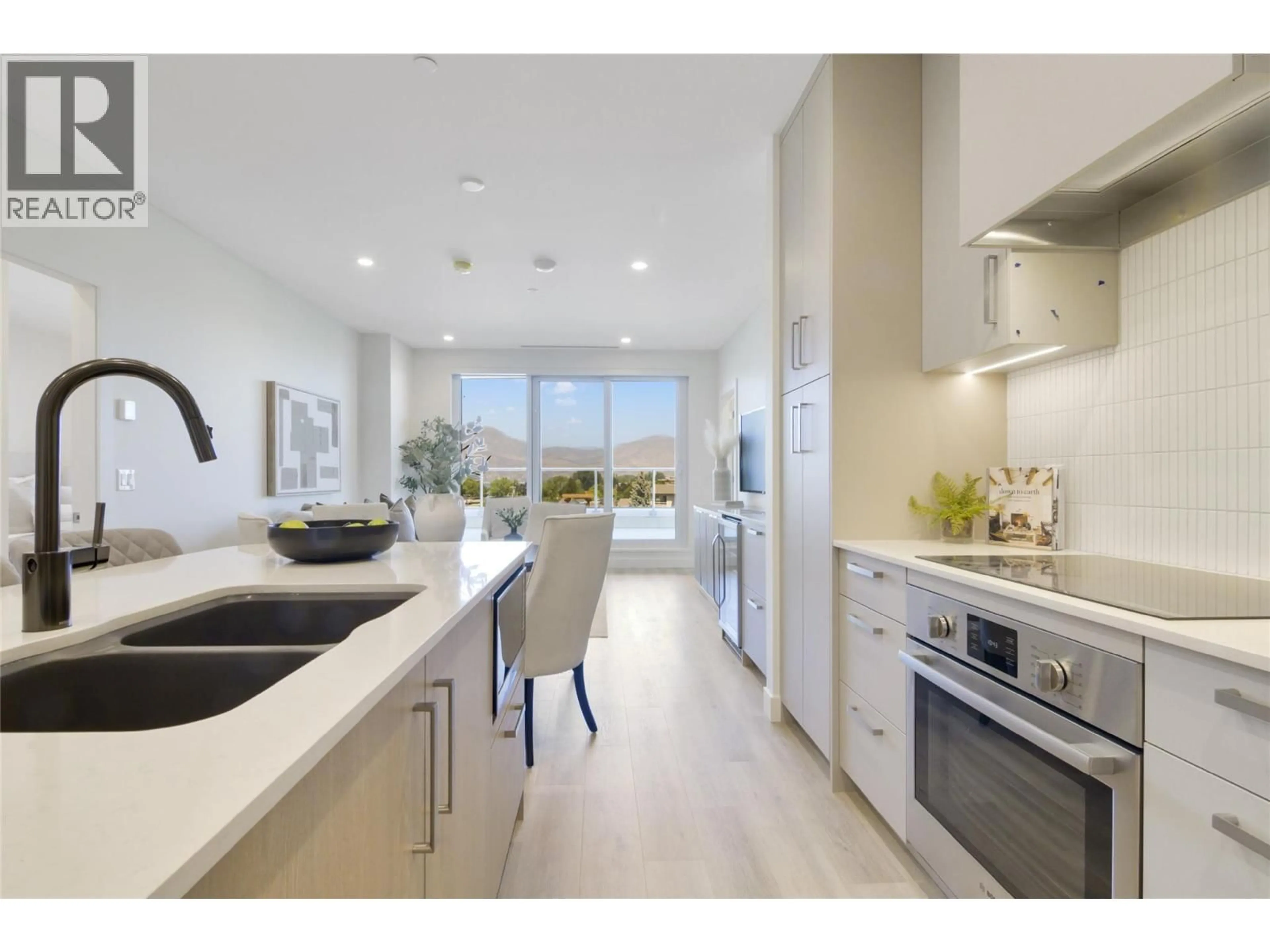 Open concept kitchen, ceramic/tile floor for 514 - 3300 LAKESHORE ROAD, Kelowna British Columbia V1W0J9