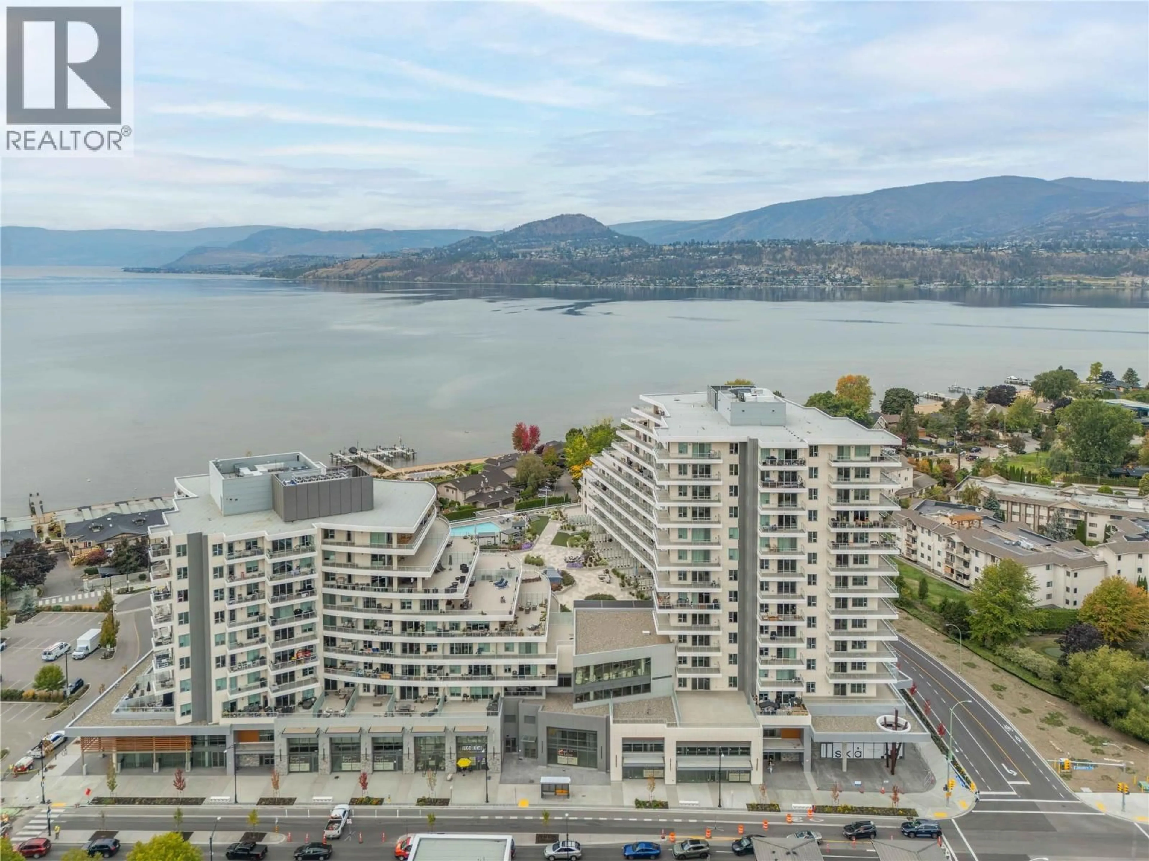 A pic from outside/outdoor area/front of a property/back of a property/a pic from drone, water/lake/river/ocean view for 503 - 3300 LAKESHORE ROAD, Kelowna British Columbia V1W0J9