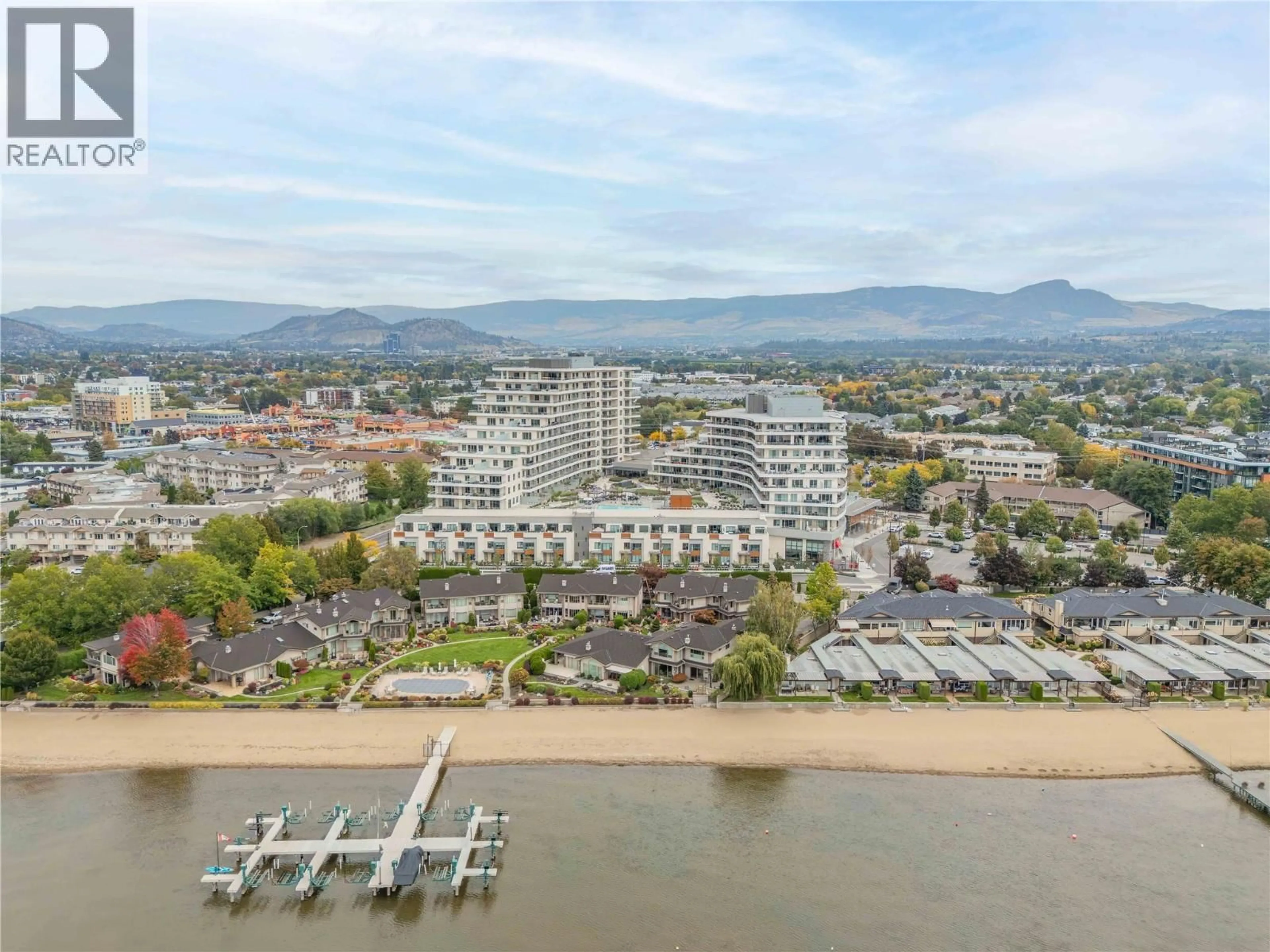A pic from outside/outdoor area/front of a property/back of a property/a pic from drone, water/lake/river/ocean view for 503 - 3300 LAKESHORE ROAD, Kelowna British Columbia V1W0J9