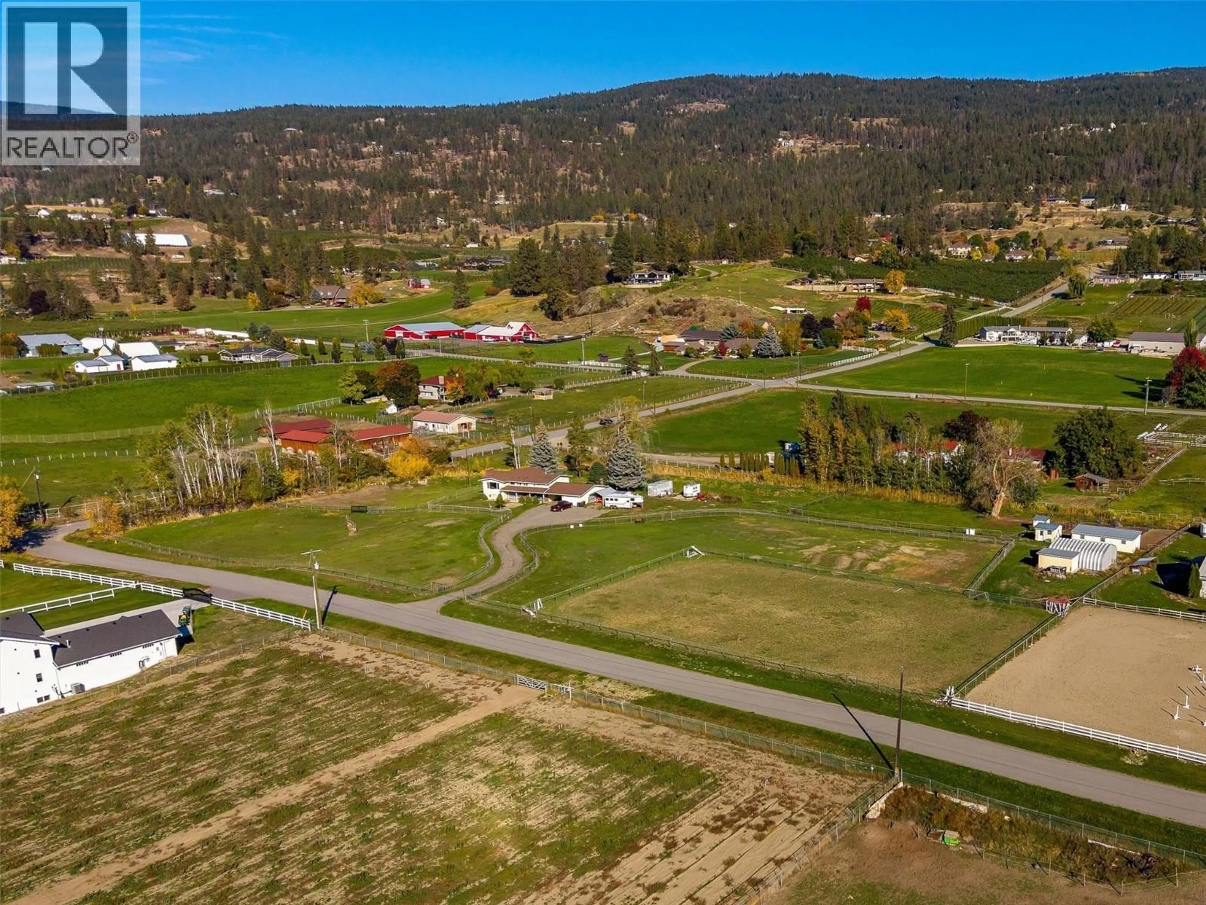 A pic from outside/outdoor area/front of a property/back of a property/a pic from drone, mountain view for 5451 WHELAN ROAD, Kelowna British Columbia V1X7V5