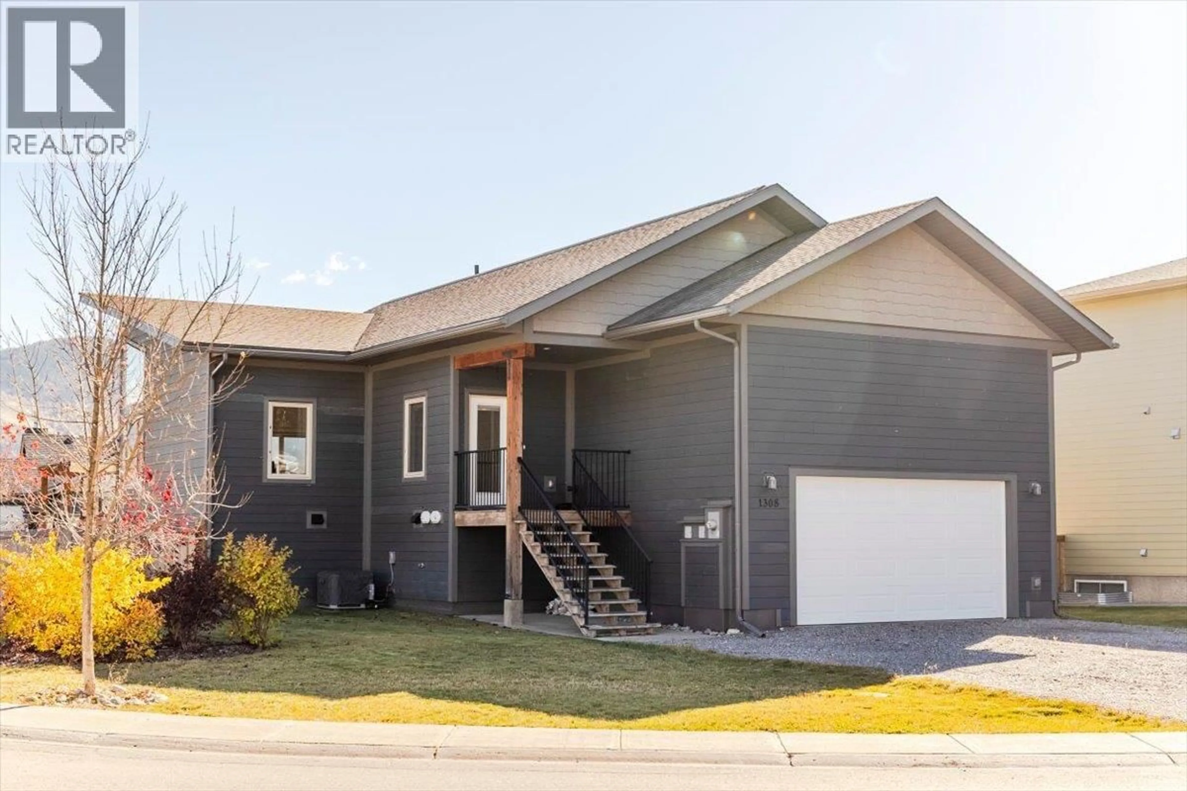 Home with vinyl exterior material, street for 1308 CHERRYWOOD BOULEVARD, Sparwood British Columbia V0B2G2