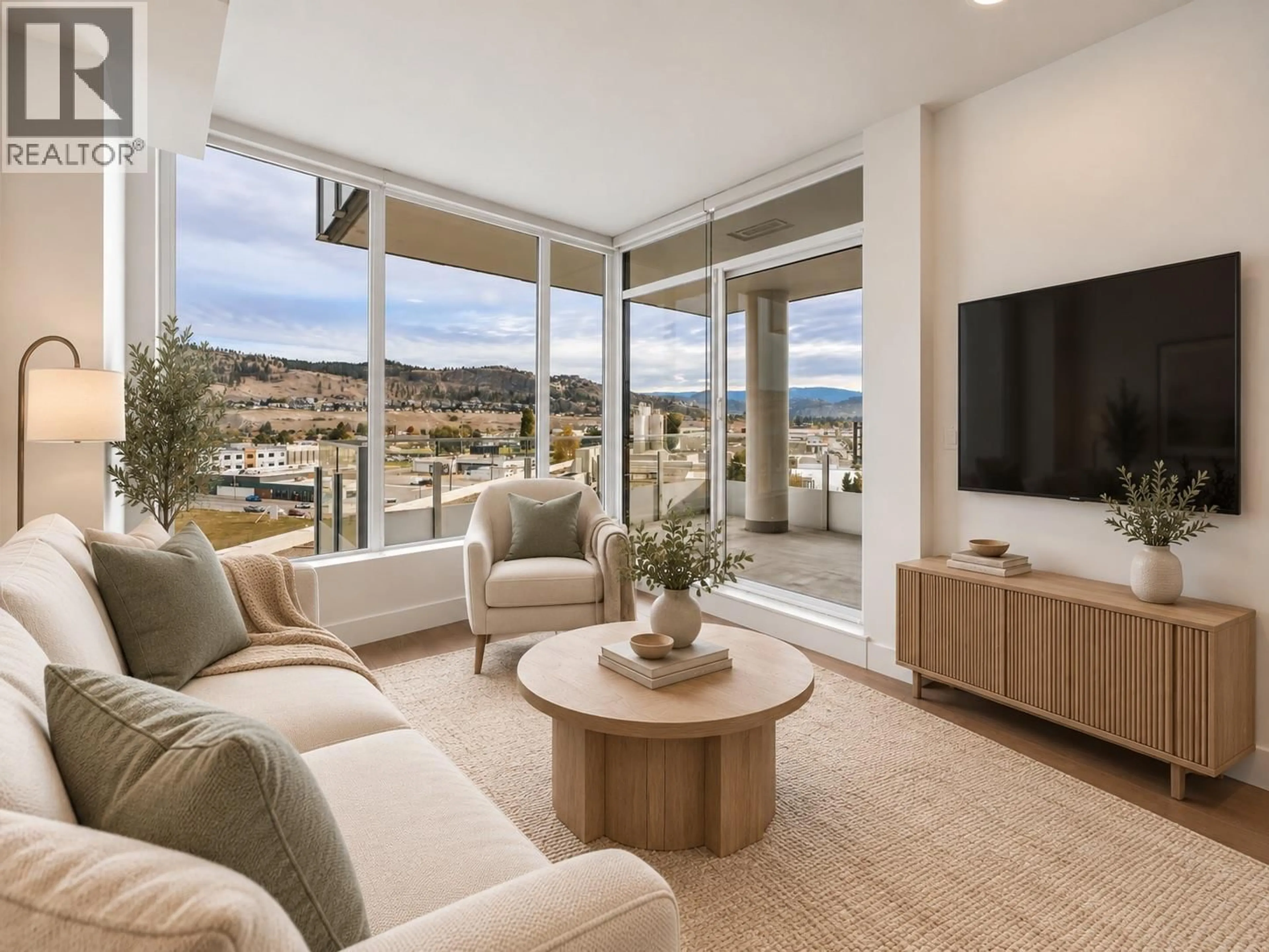 Living room with furniture, unknown for 701 - 1181 SUNSET DRIVE, Kelowna British Columbia V1Y0L4