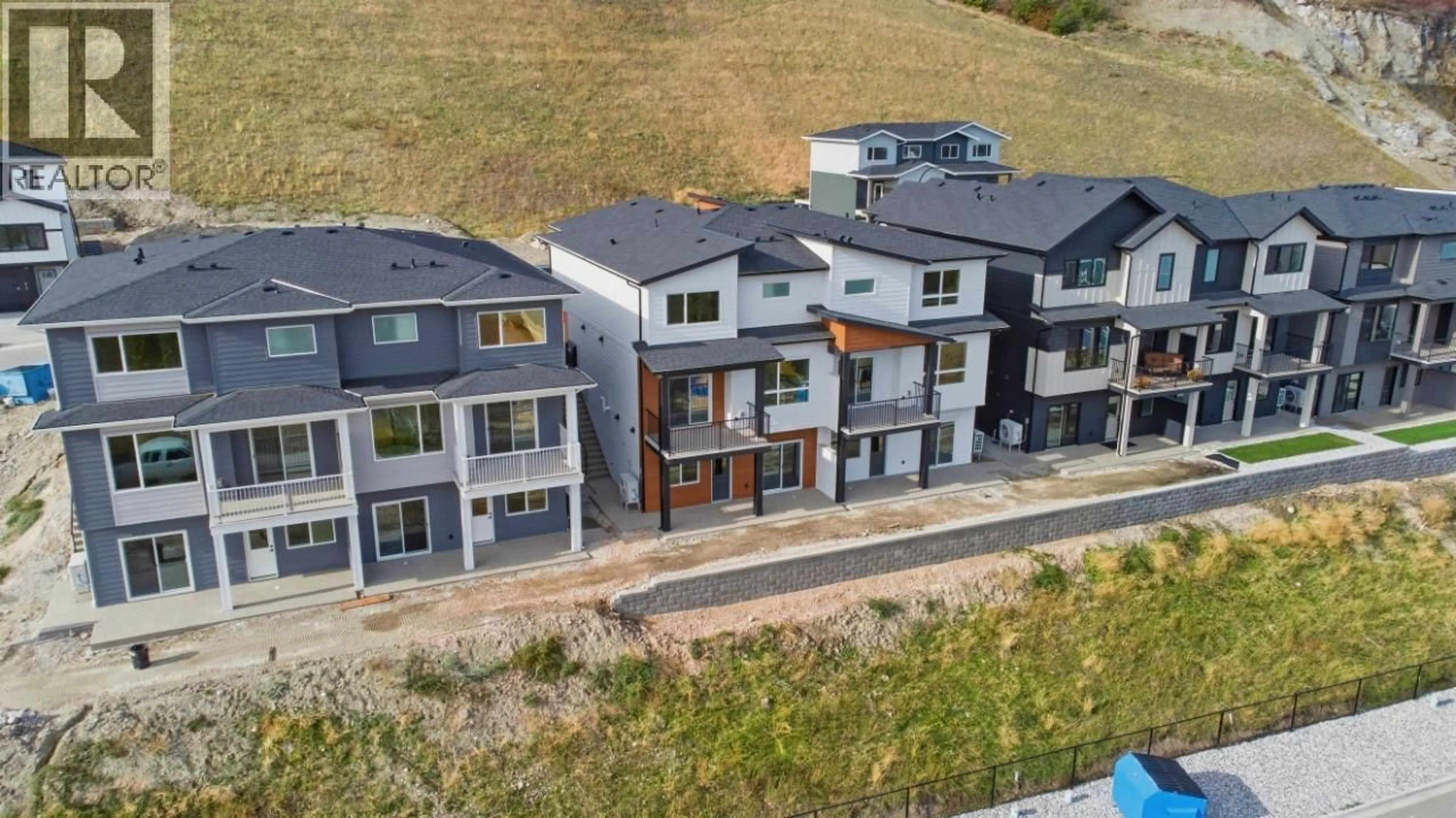 A pic from outside/outdoor area/front of a property/back of a property/a pic from drone, mountain view for 419 ARROWLEAF DRIVE, Coldstream British Columbia V1B0B5