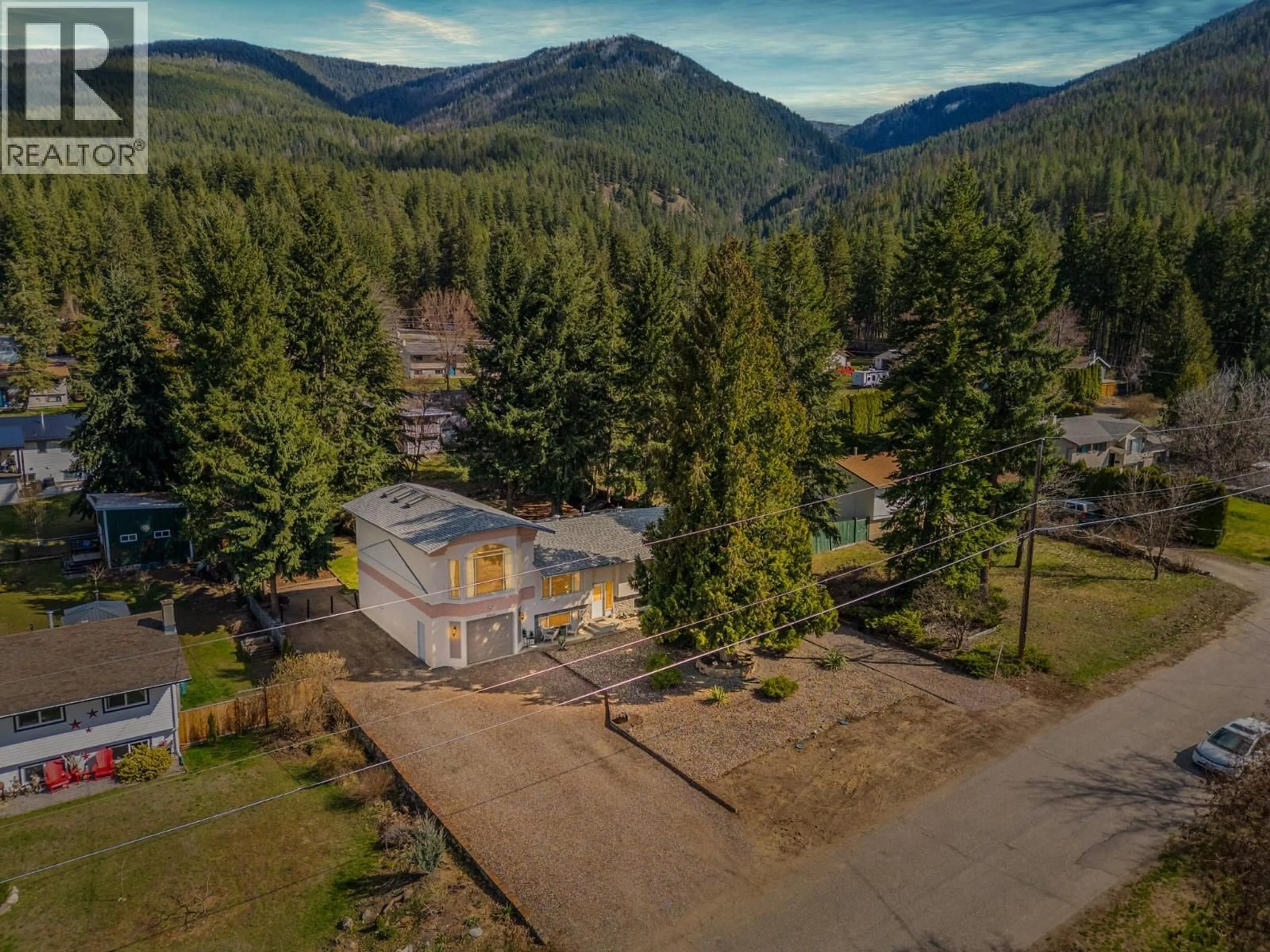 A pic from outside/outdoor area/front of a property/back of a property/a pic from drone, mountain view for 3419 LARCH DRIVE, Armstrong British Columbia V4Y0S8