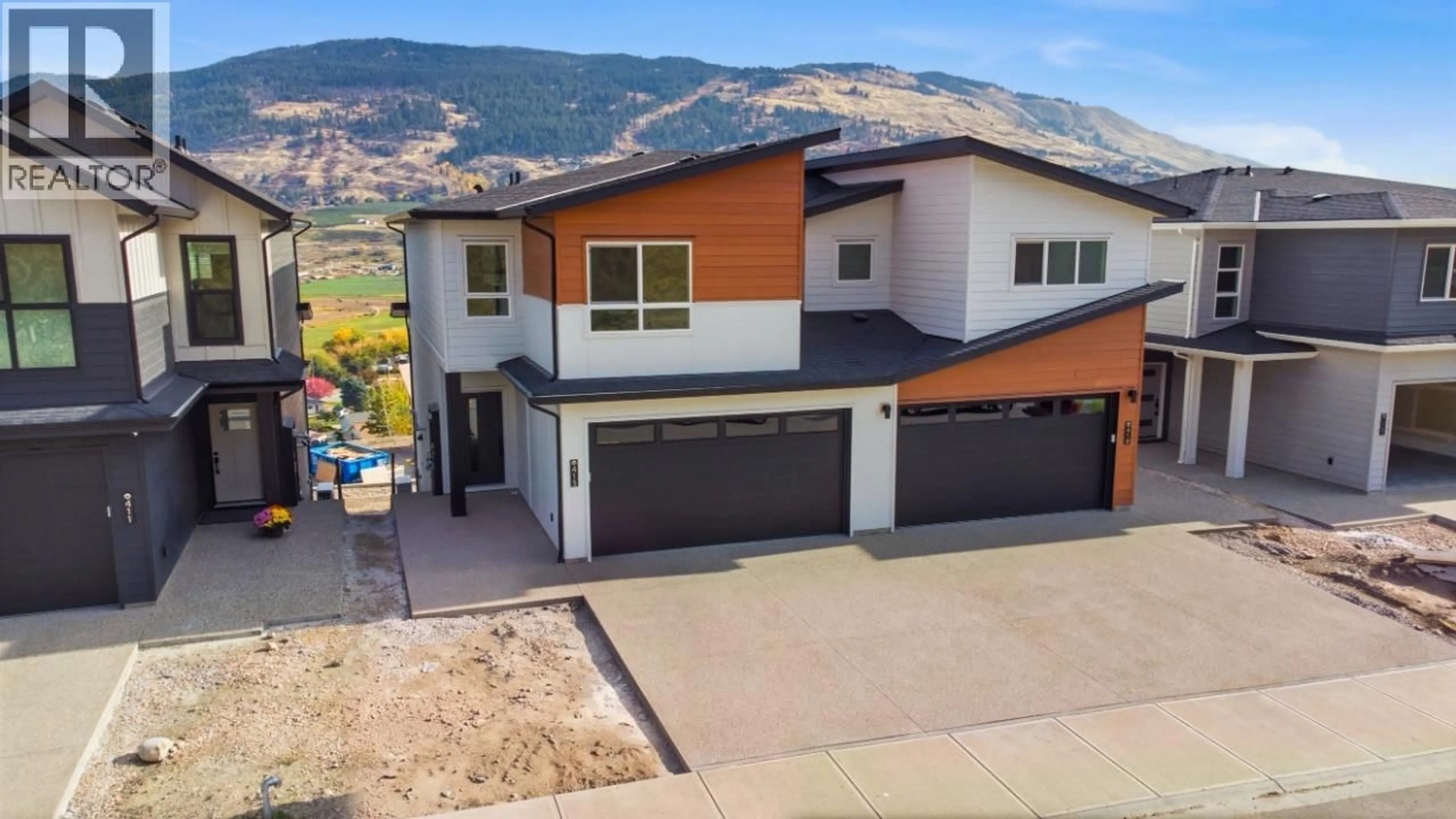 A pic from outside/outdoor area/front of a property/back of a property/a pic from drone, mountain view for 415 ARROWLEAF DRIVE, Coldstream British Columbia V1B0B5