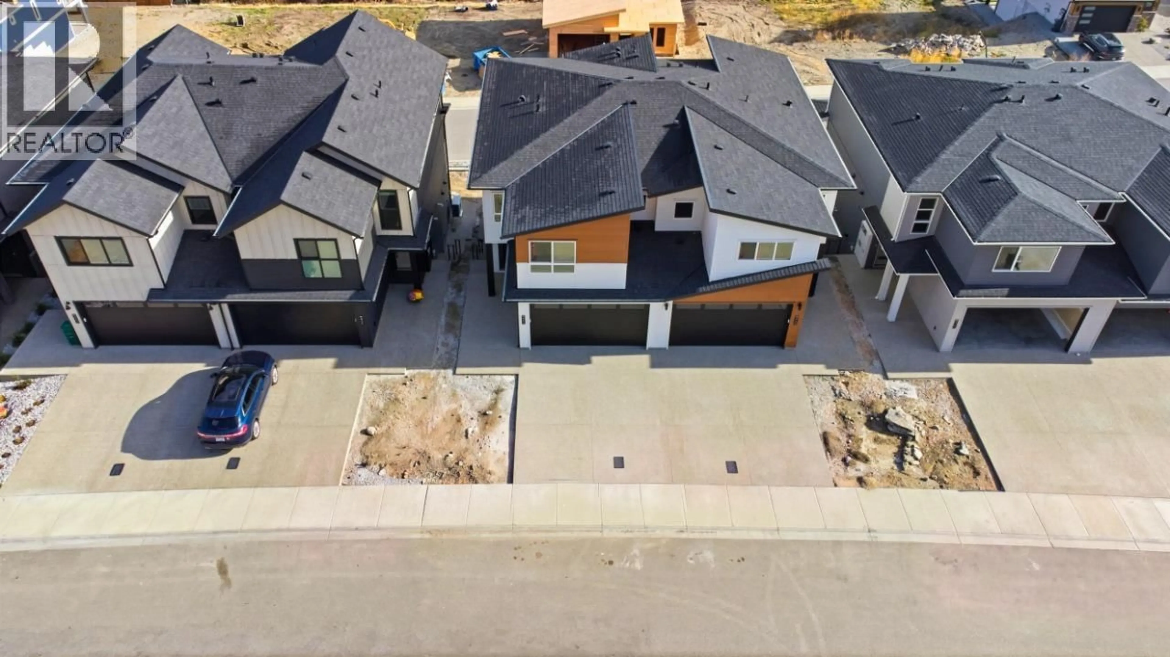 A pic from outside/outdoor area/front of a property/back of a property/a pic from drone, street for 415 ARROWLEAF DRIVE, Coldstream British Columbia V1B0B5