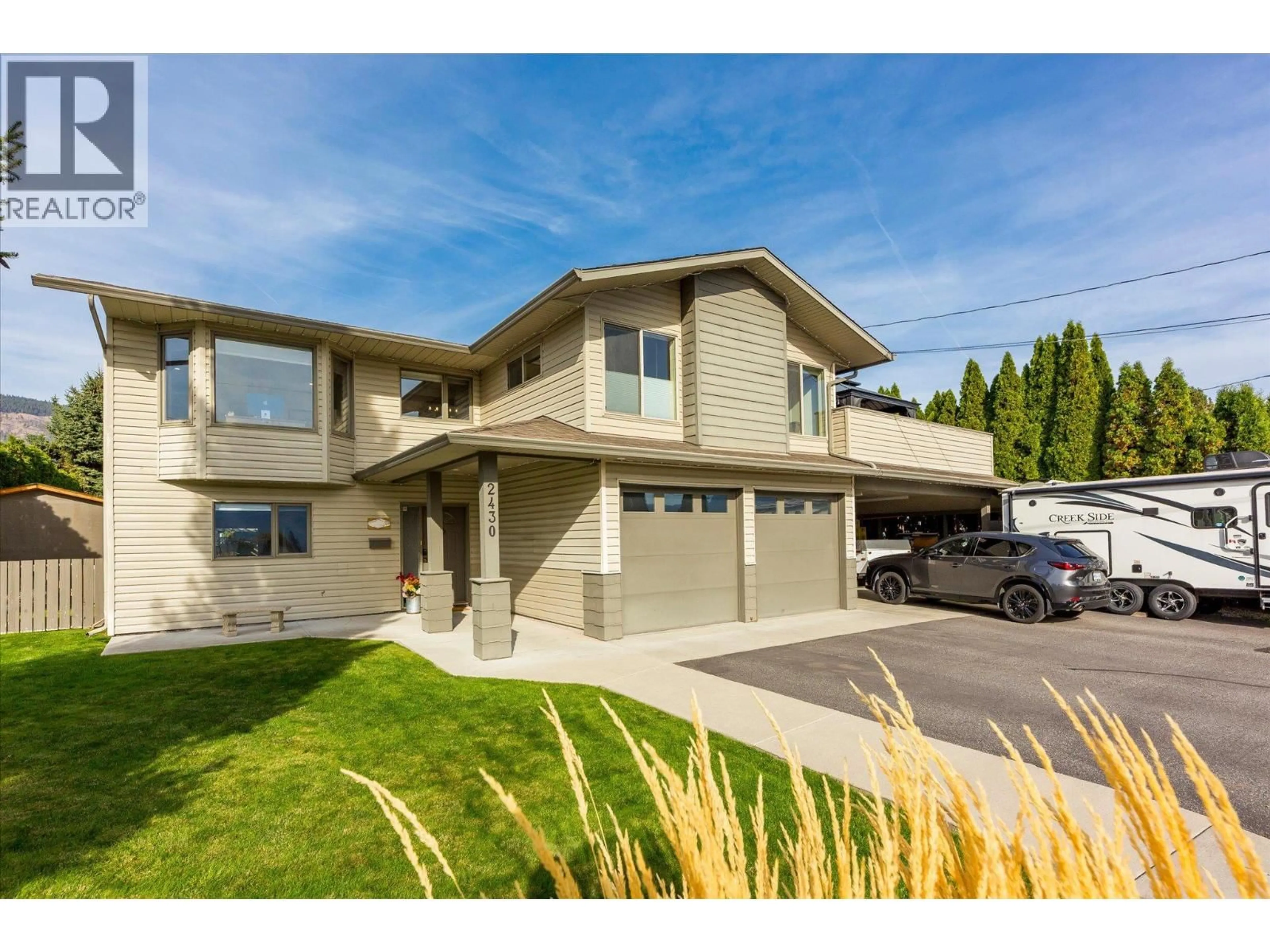 Home with vinyl exterior material, street for 2430 CHIEFTAIN ROAD, West Kelowna British Columbia V4T1N3