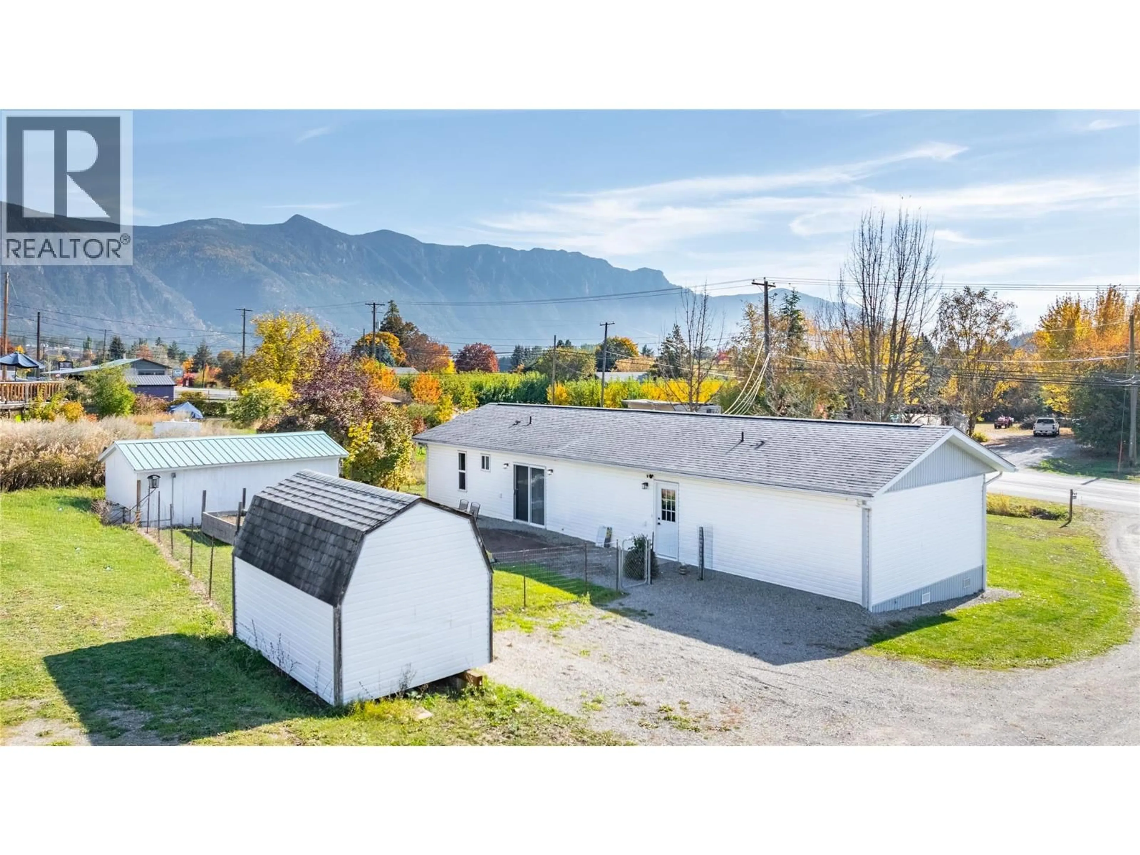 A pic from outside/outdoor area/front of a property/back of a property/a pic from drone, mountain view for 2812 HIGHWAY 3 OTHER, Creston British Columbia V0B1G1