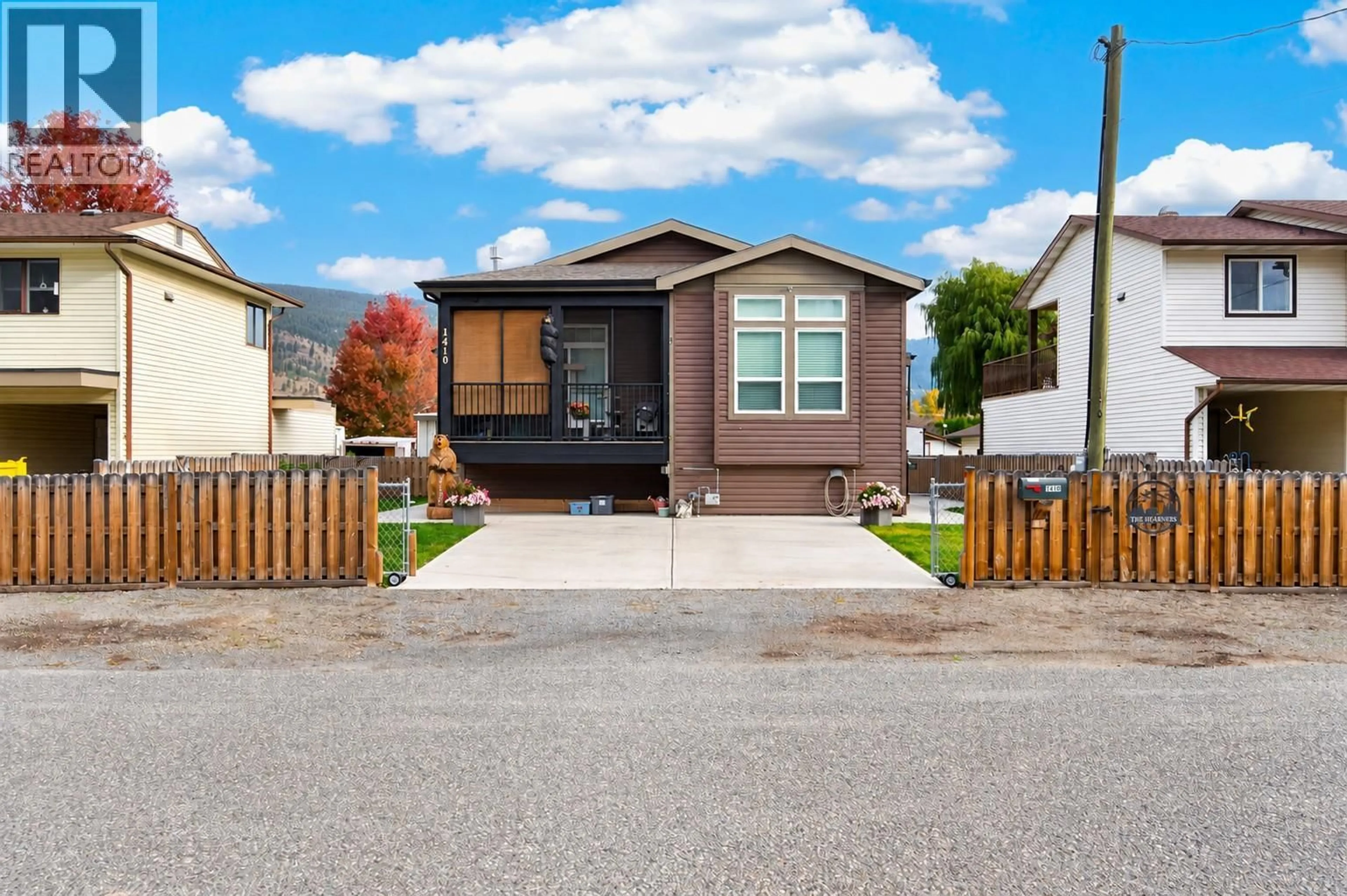 Home with vinyl exterior material, street for 1410 WALNUT AVENUE, Merritt British Columbia V1K1L3