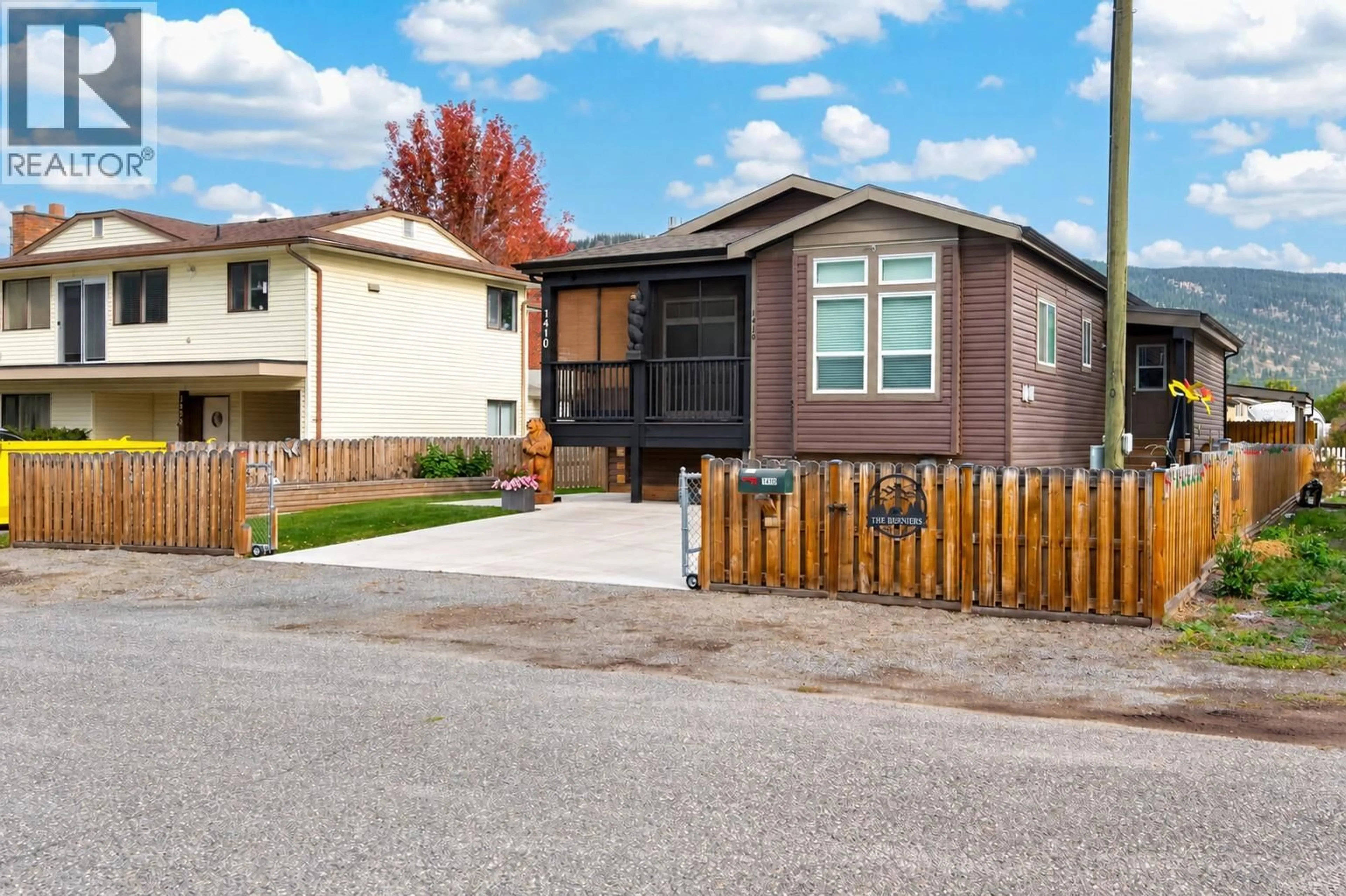 Home with vinyl exterior material, street for 1410 WALNUT AVENUE, Merritt British Columbia V1K1L3