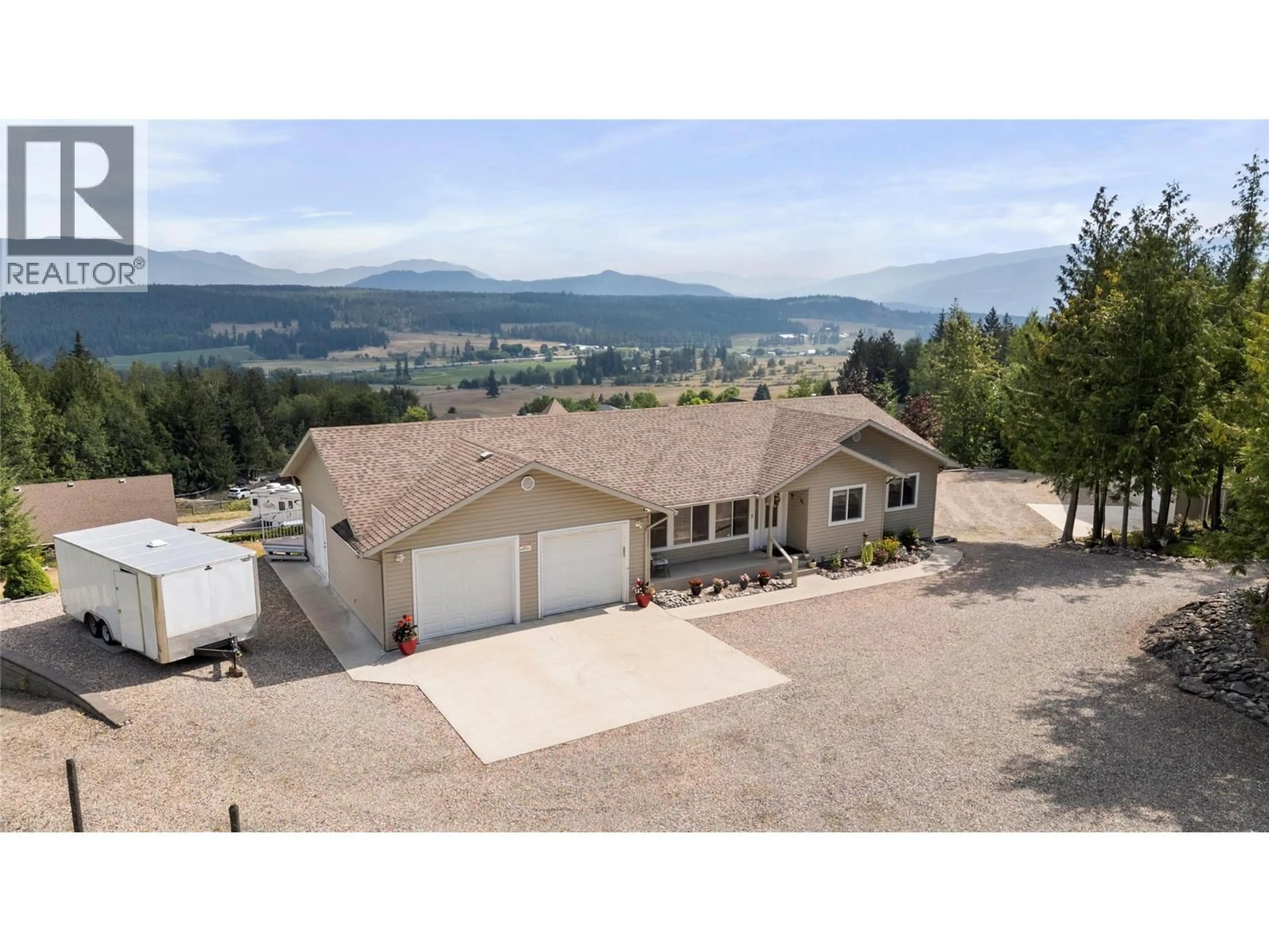 A pic from outside/outdoor area/front of a property/back of a property/a pic from drone, mountain view for 1406 HUCKLEBERRY DRIVE, Sorrento British Columbia V0E2W1