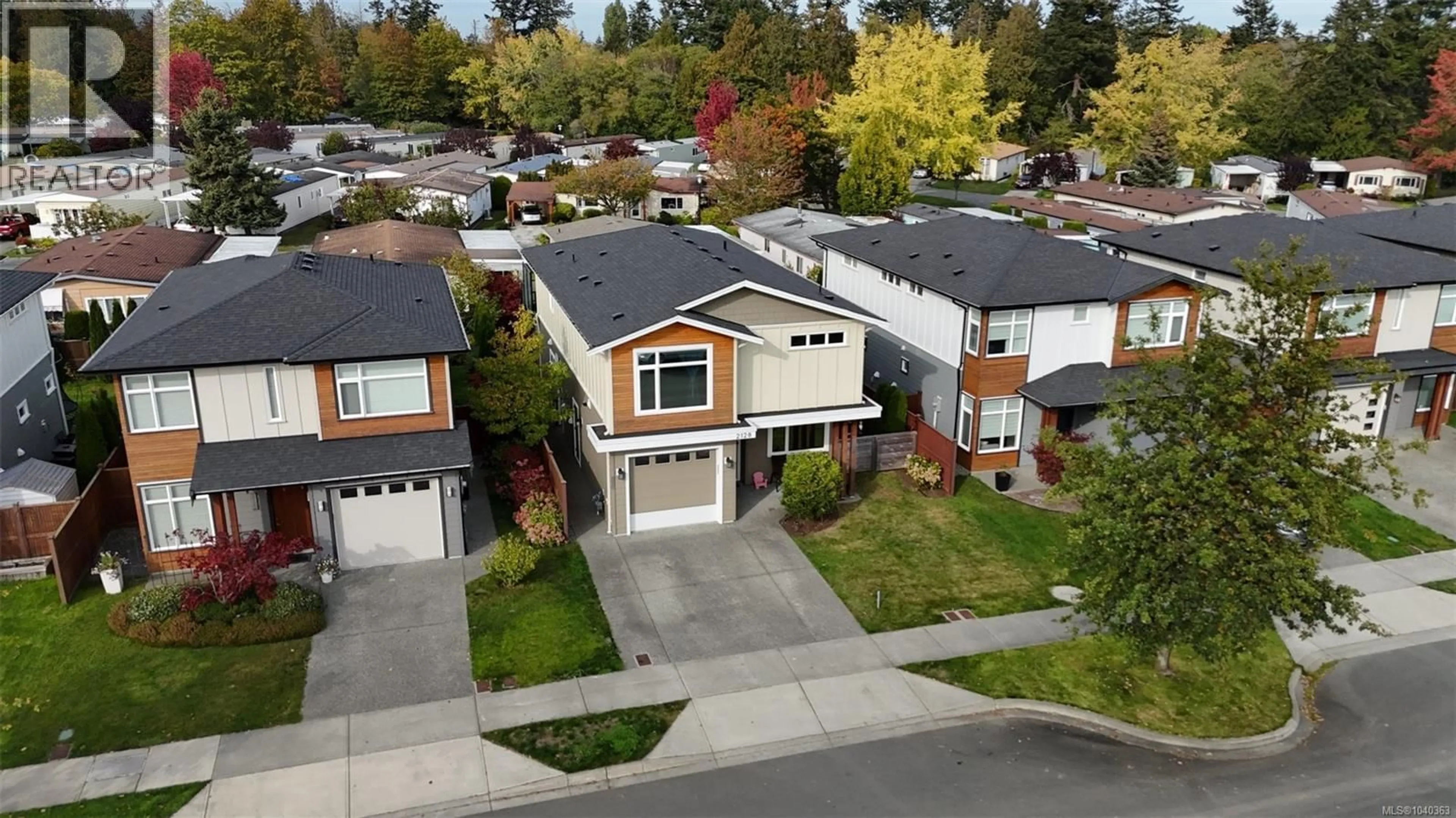 A pic from outside/outdoor area/front of a property/back of a property/a pic from drone, street for 2128 DEERBRUSH CRESCENT, North Saanich British Columbia V8L0C5