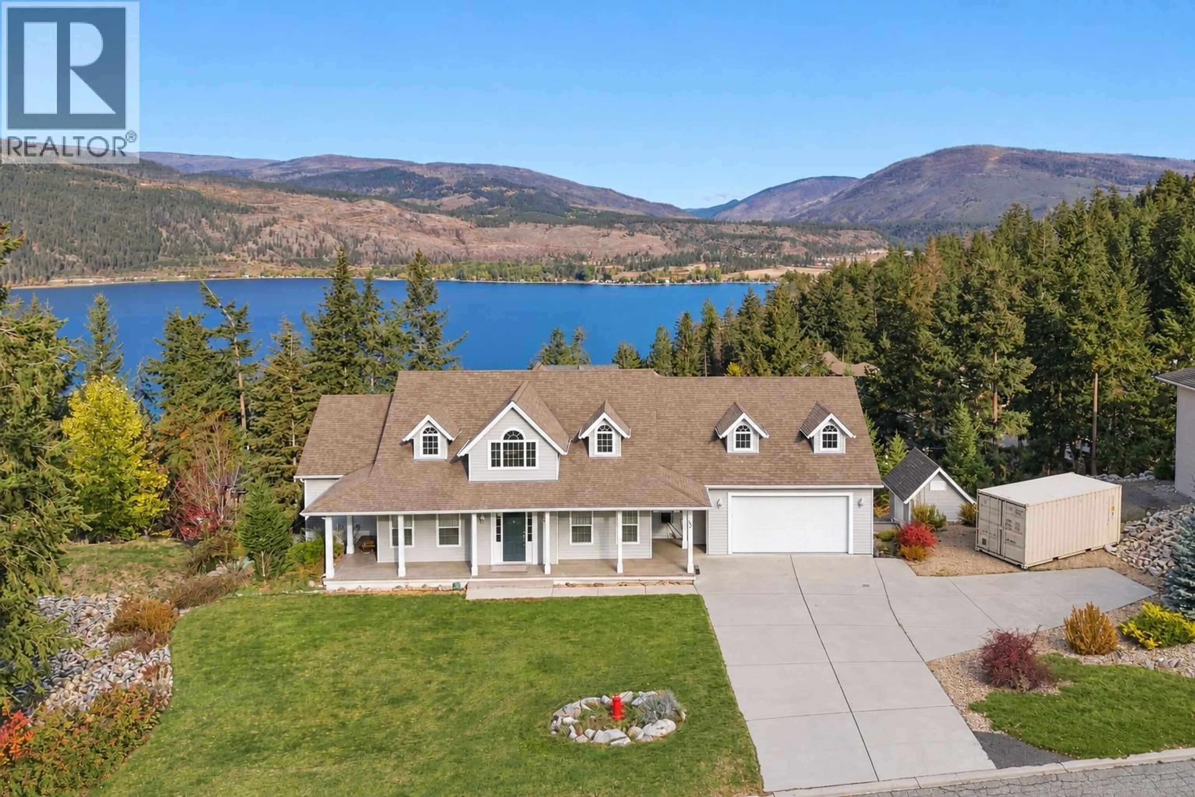 A pic from outside/outdoor area/front of a property/back of a property/a pic from drone, water/lake/river/ocean view for 55 PEREGRINE WAY, Vernon British Columbia V1H1E4