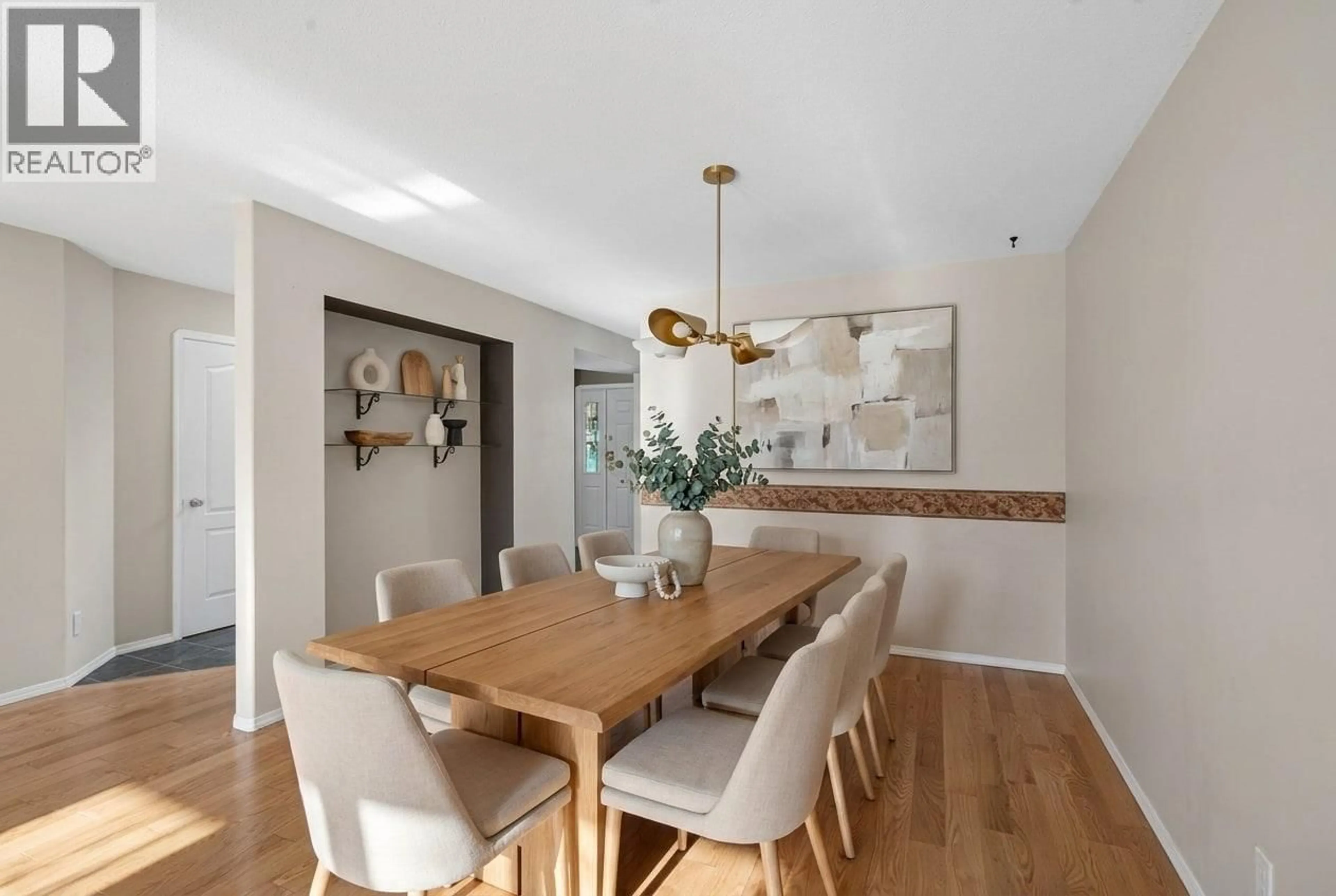 Dining room, wood/laminate floor for 16 - 535 GLENMEADOWS ROAD, Kelowna British Columbia V1V1X7