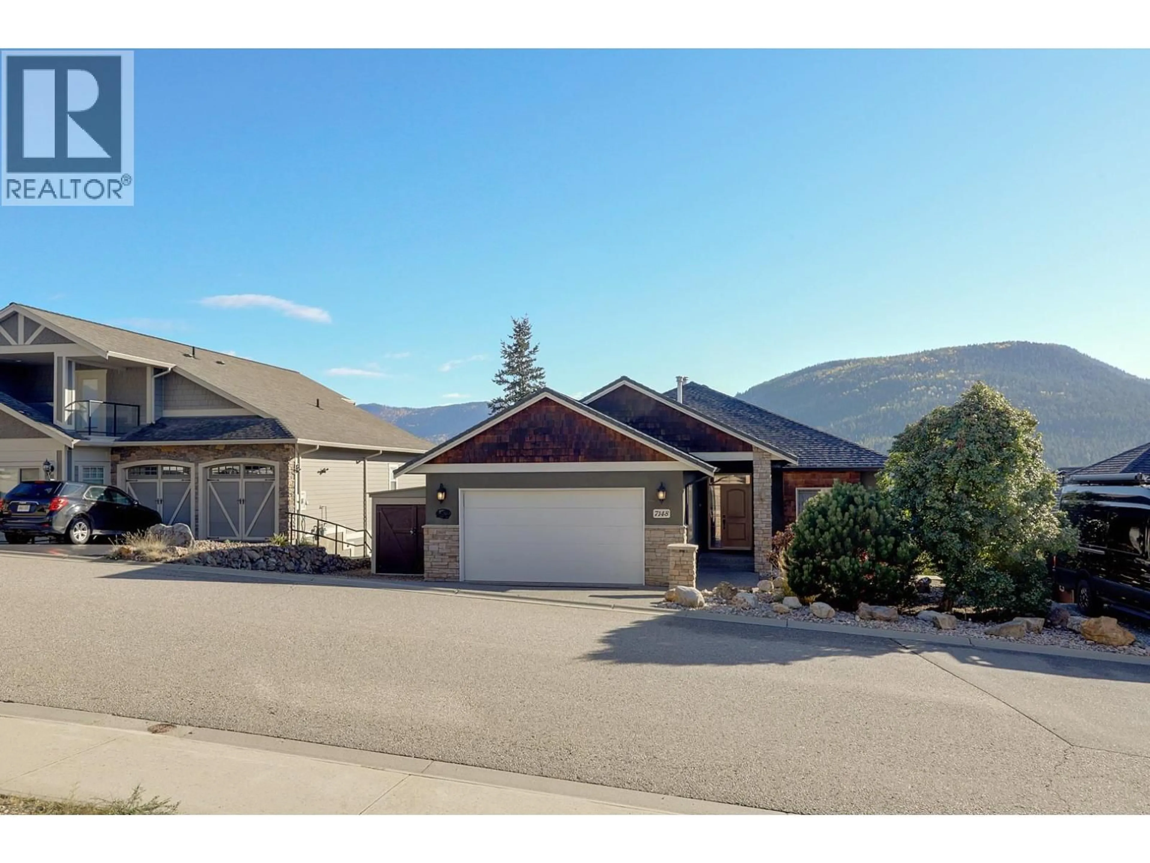 A pic from outside/outdoor area/front of a property/back of a property/a pic from drone, mountain view for 7148 TABOR DRIVE, Vernon British Columbia V1B4A4