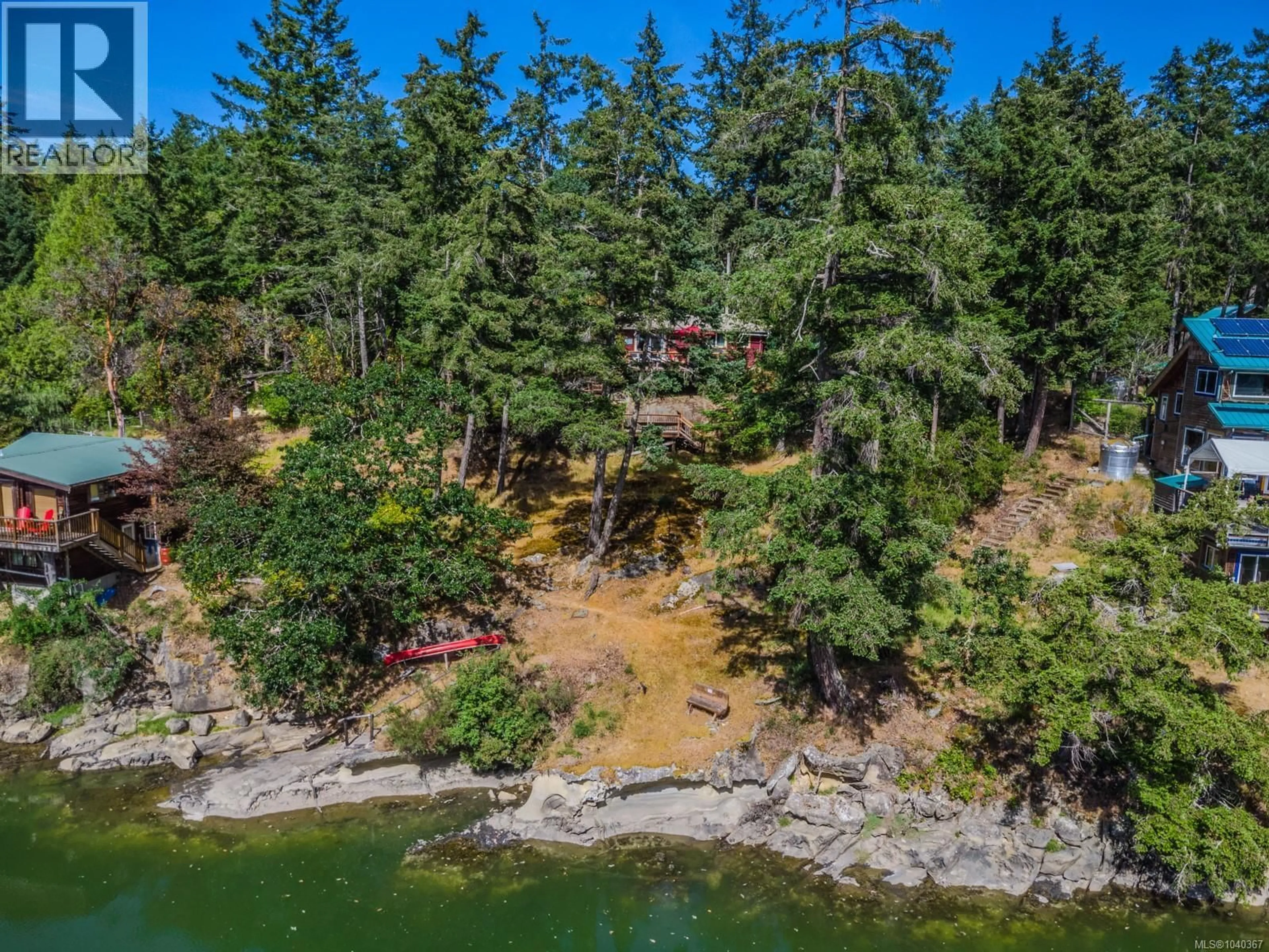 A pic from outside/outdoor area/front of a property/back of a property/a pic from drone, water/lake/river/ocean view for 75 WHALER BAY ROAD, Galiano Island British Columbia V0N1P0