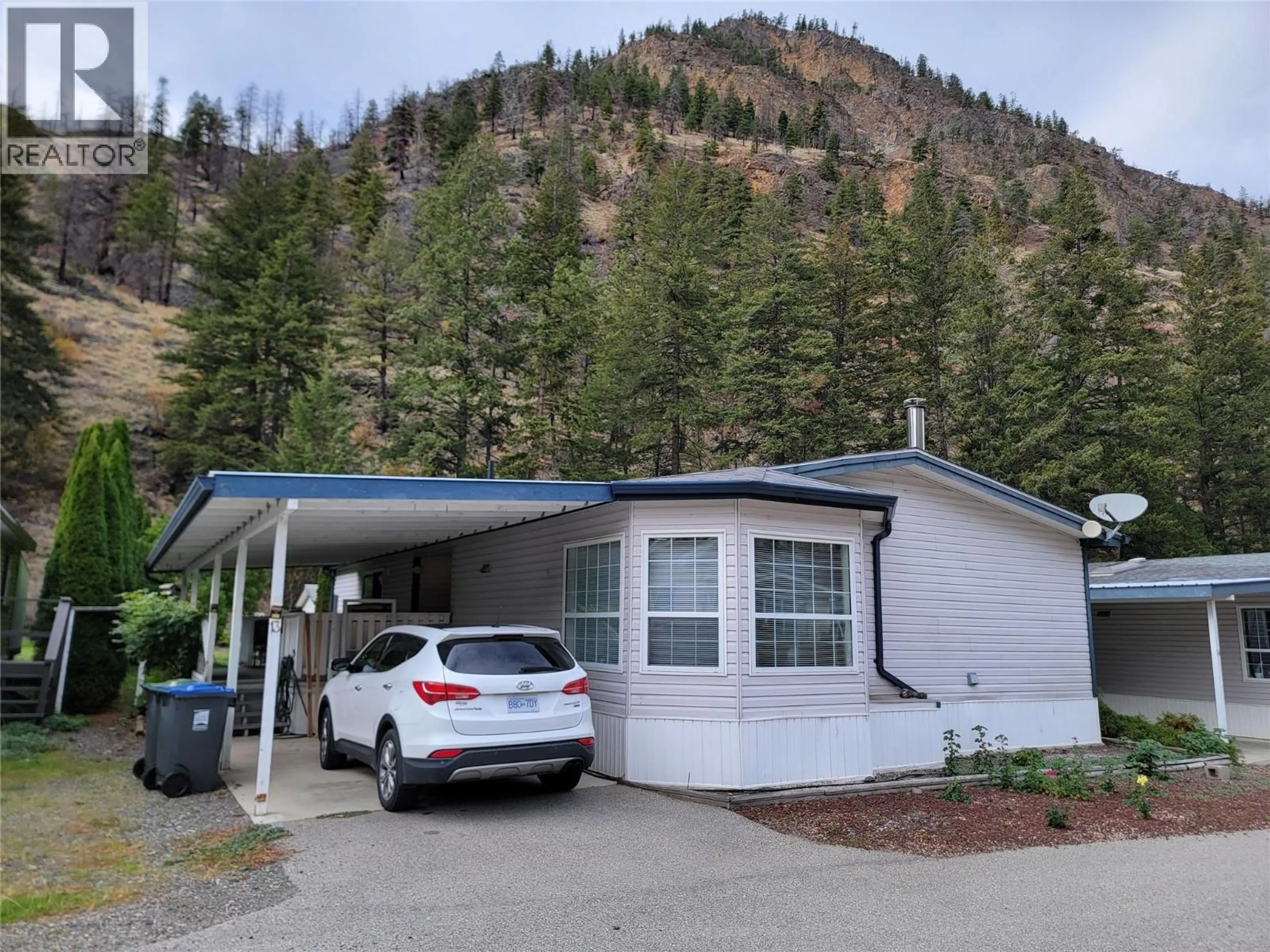 Home with vinyl exterior material, mountain view for 13 - 1518 HIGHWAY 3A OTHER, Keremeos British Columbia V0X1N6