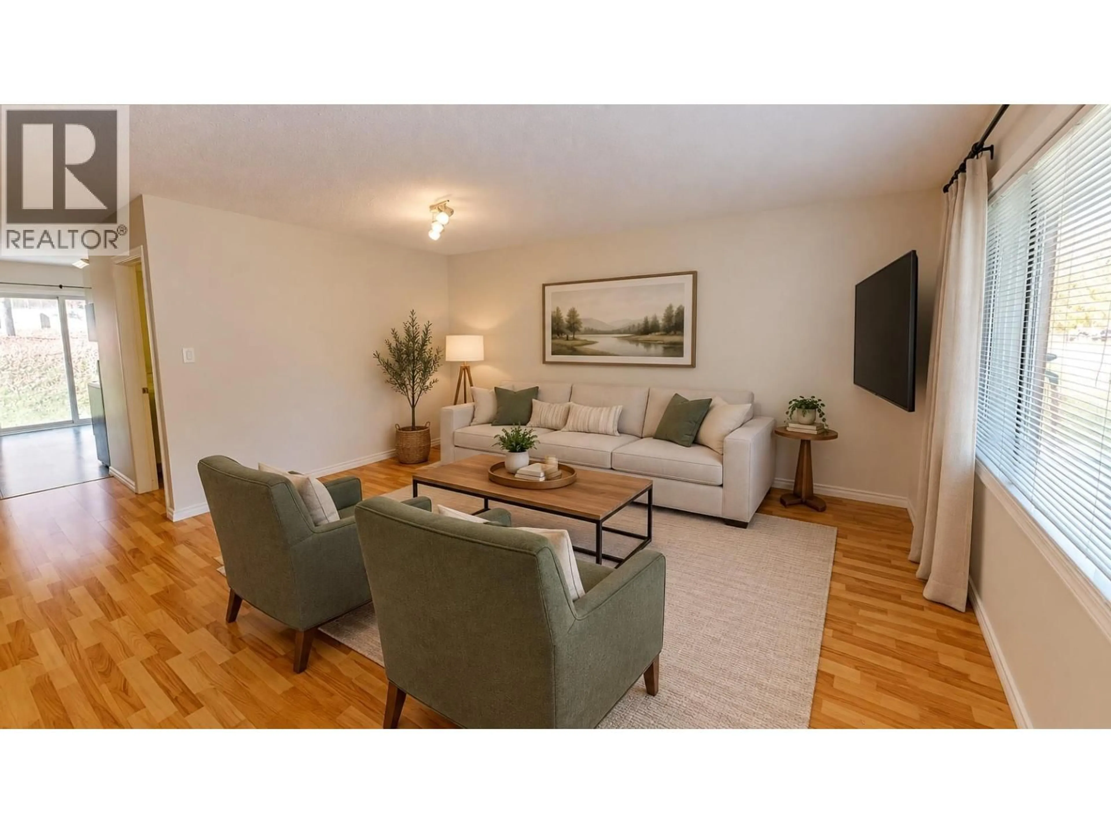 Living room with furniture, wood/laminate floor for 5775 COLUMBIA ROAD, Edgewater British Columbia V0A1E0