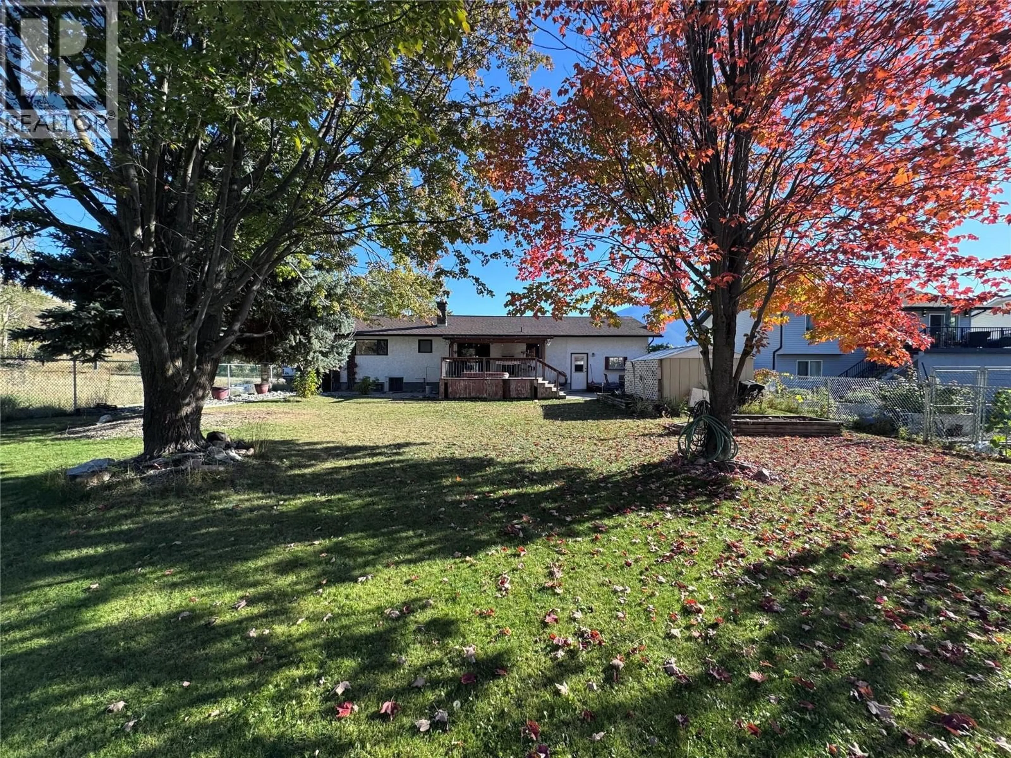 A pic from outside/outdoor area/front of a property/back of a property/a pic from drone, street for 243 WINNIPEG AVENUE, Grand Forks British Columbia V0H1H0
