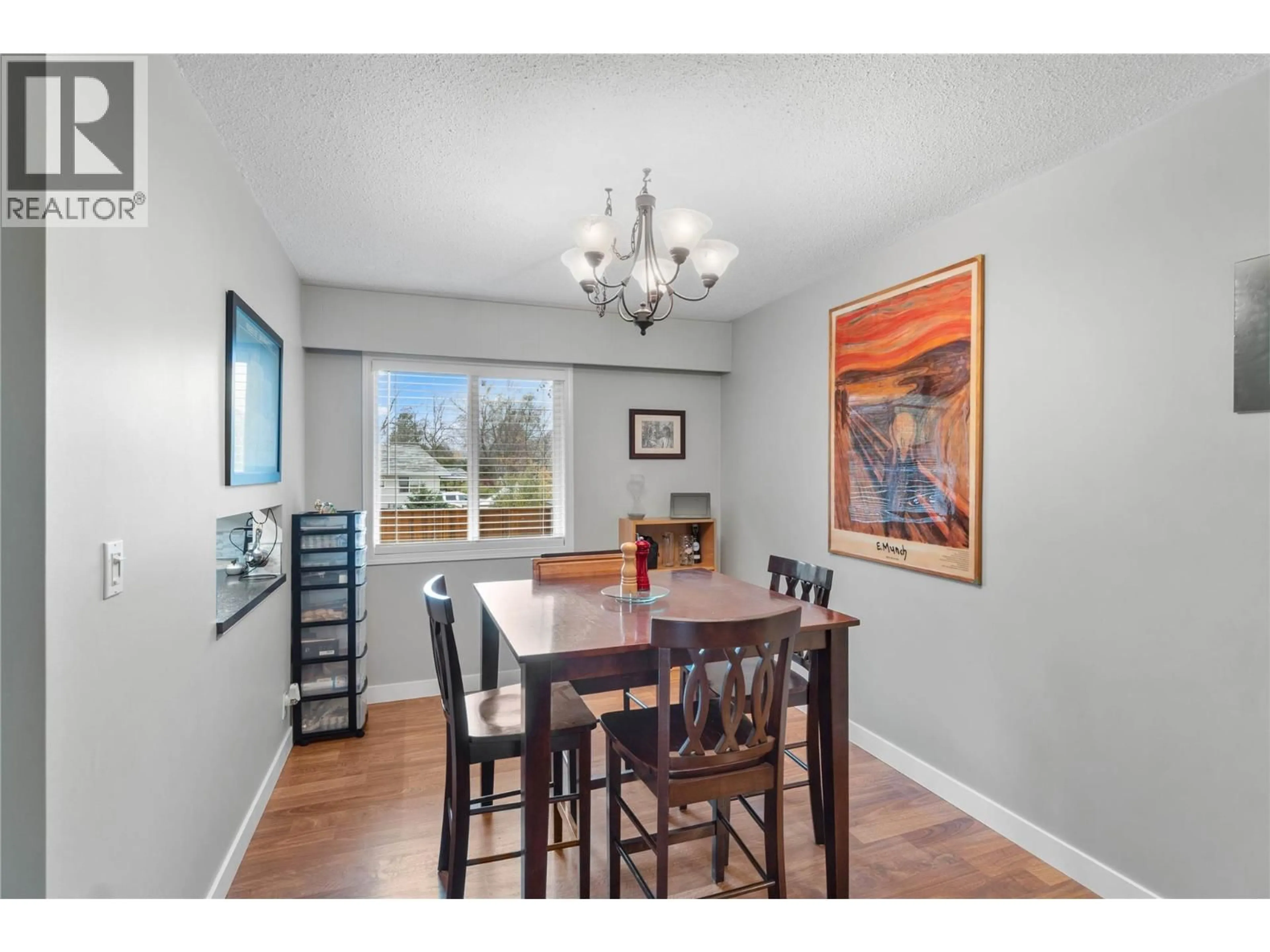 Dining room, wood/laminate floor for 695 STEINKE PLACE, Kamloops British Columbia V2B7L7