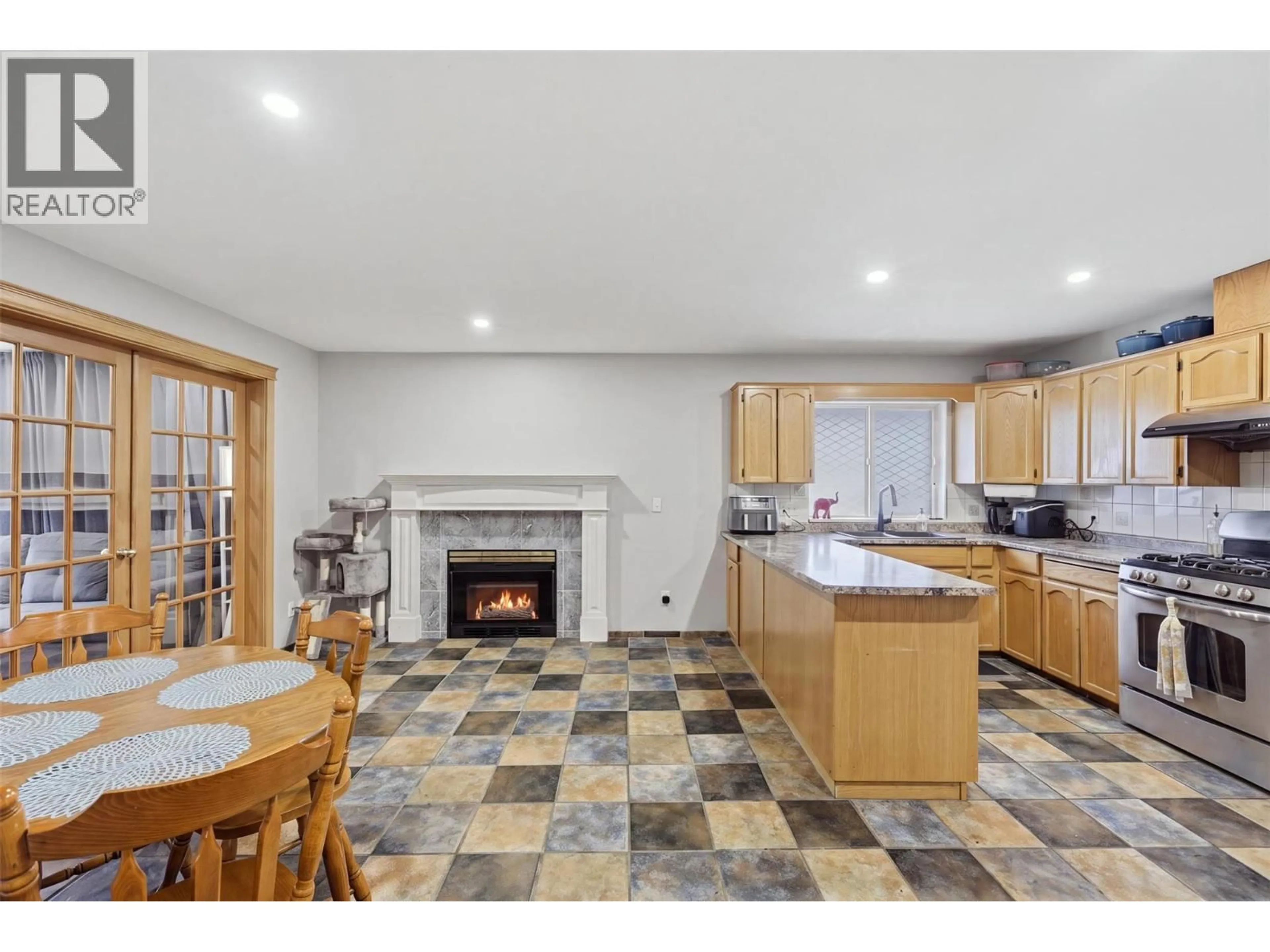 Open concept kitchen, ceramic/tile floor for 2435 DRUMMOND COURT, Kamloops British Columbia V2E1Y1