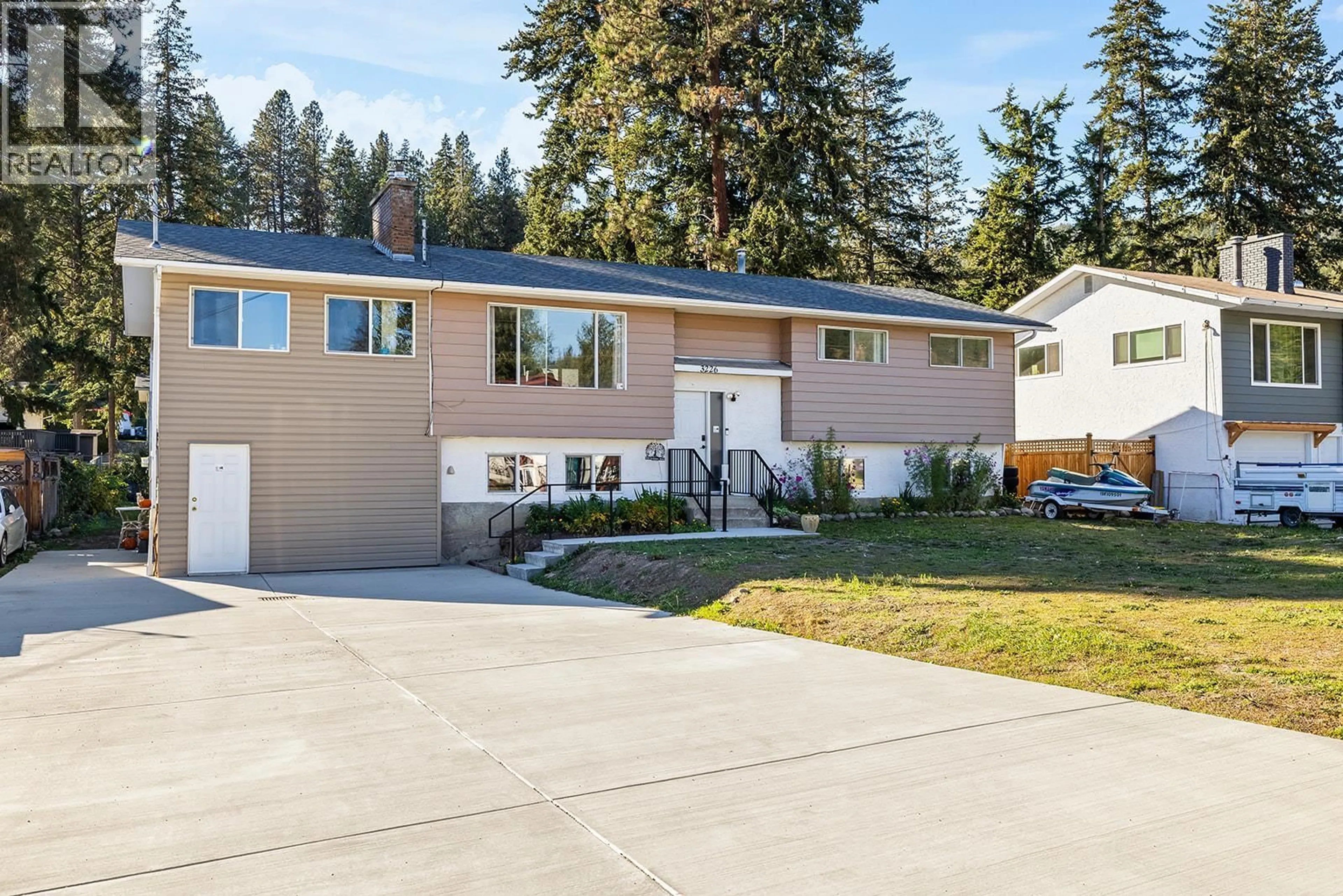 Home with vinyl exterior material, street for 3226 MCMAHON ROAD, West Kelowna British Columbia V4T1E9