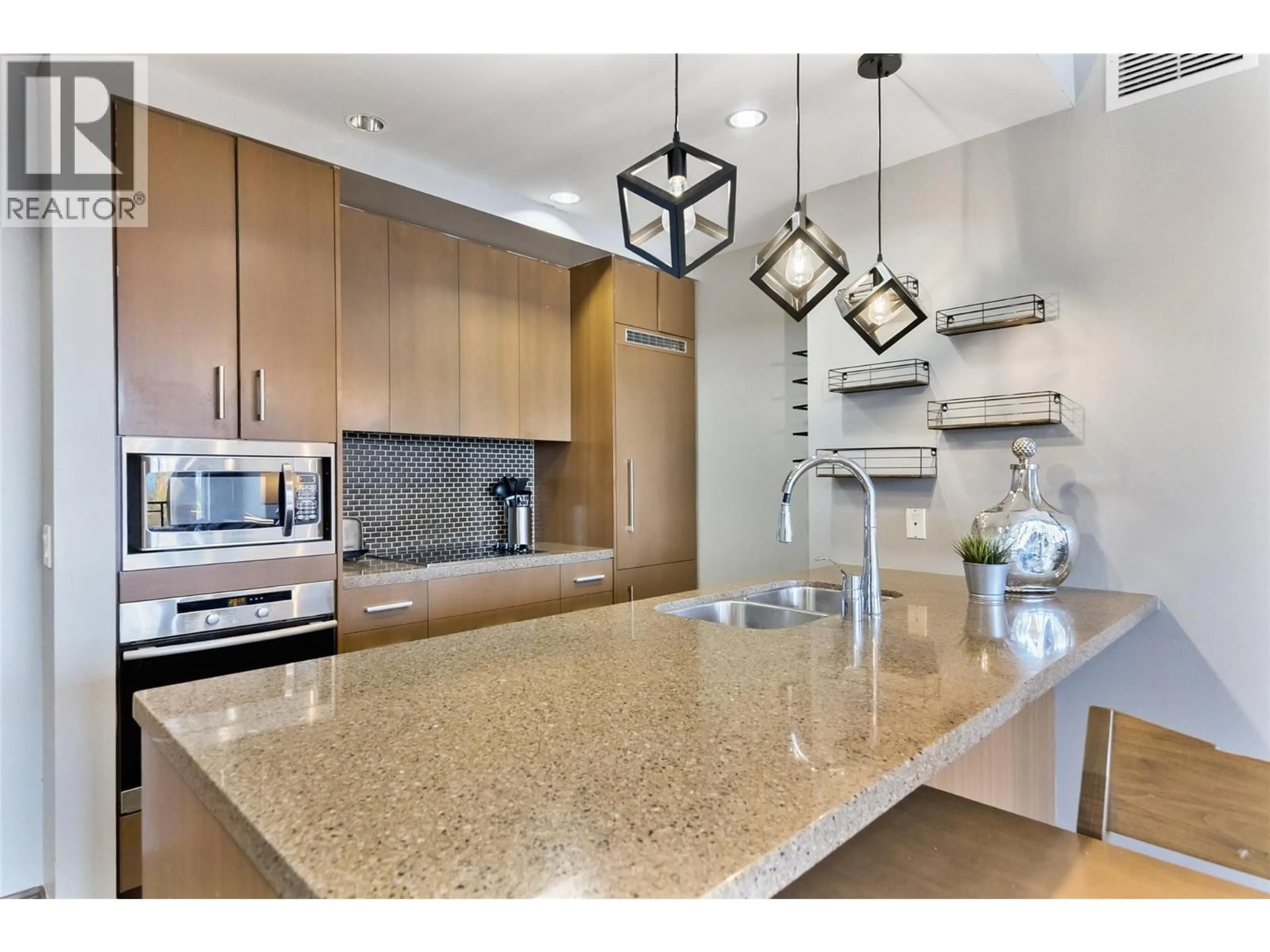 Open concept kitchen, ceramic/tile floor for 1414 - 2950 CAMOZZI ROAD, Revelstoke British Columbia V0E2S1