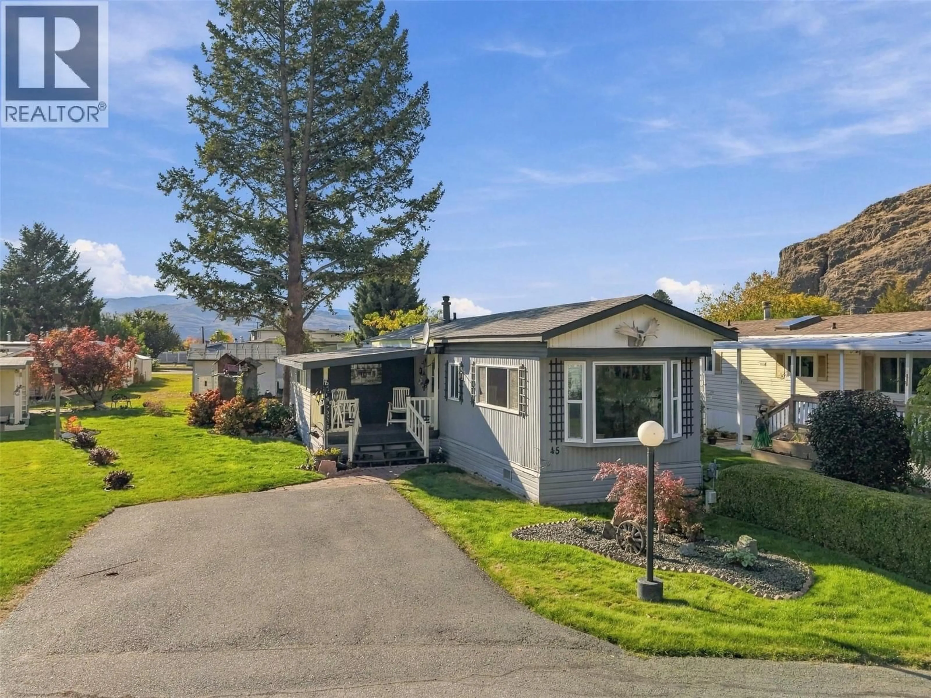 Home with vinyl exterior material, street for 45 - 2401 ORD ROAD, Kamloops British Columbia V2B7V8