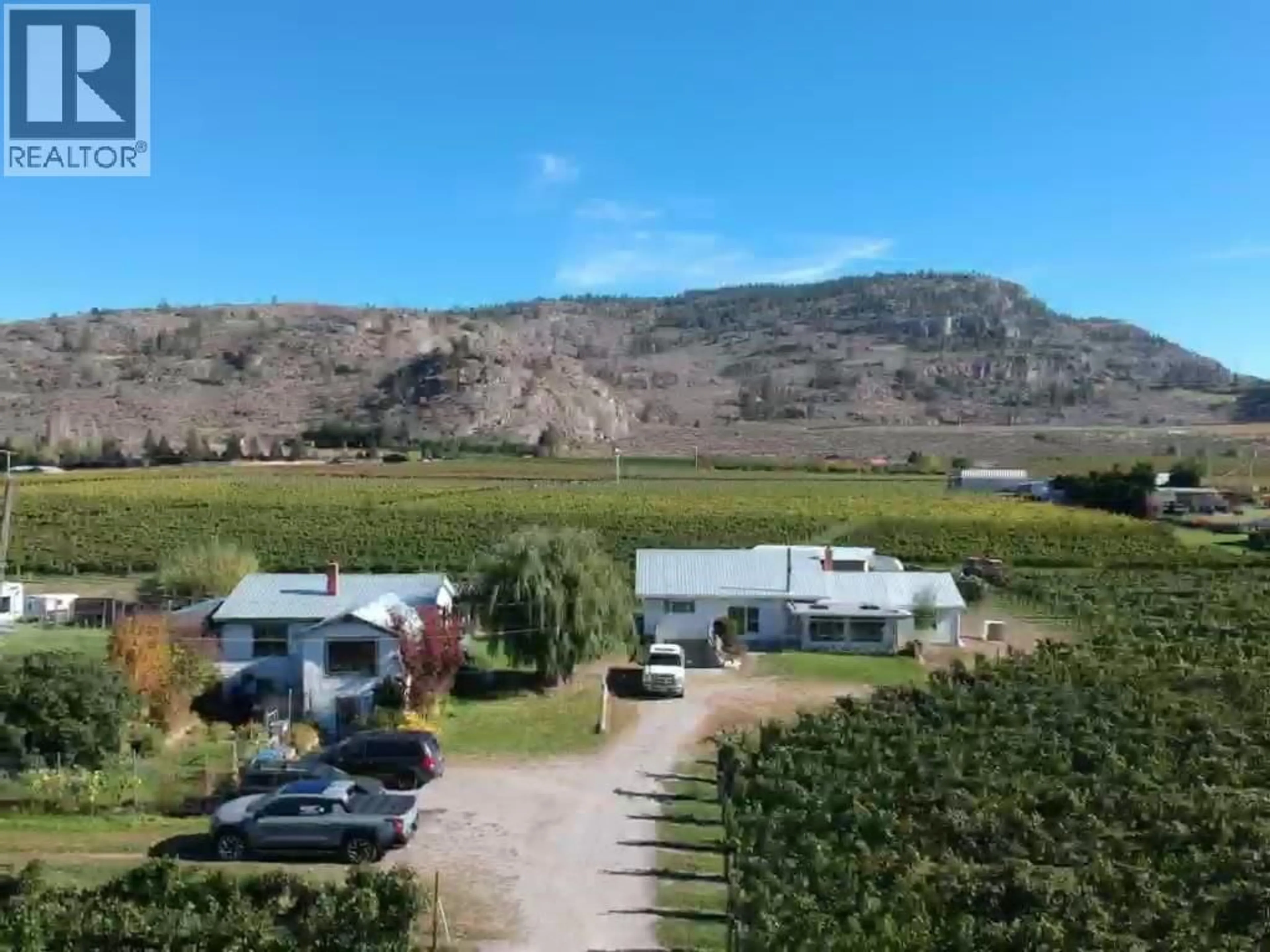 A pic from outside/outdoor area/front of a property/back of a property/a pic from drone, mountain view for 4923 RYEGRASS ROAD, Oliver British Columbia V0H1T1
