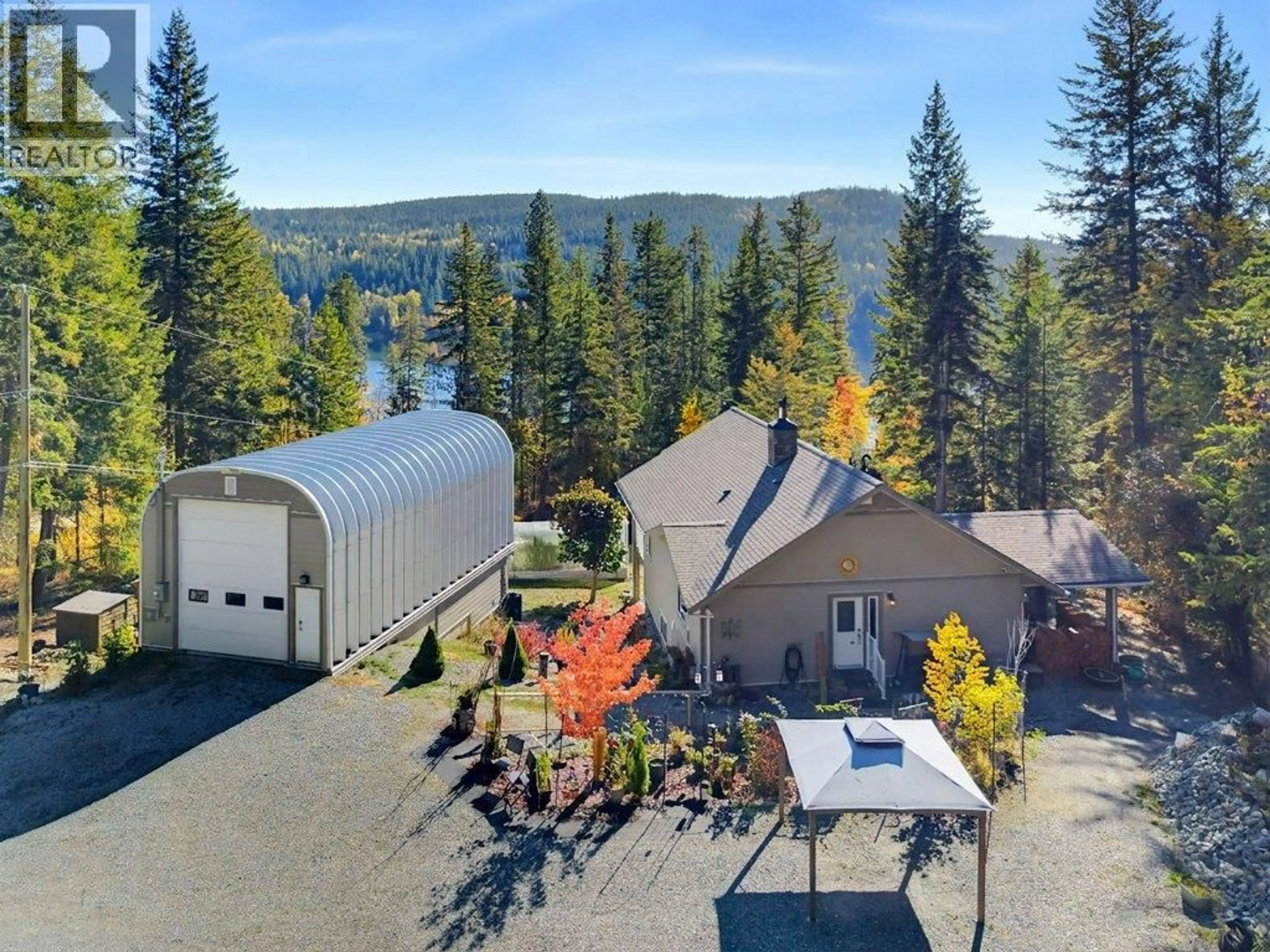 A pic from outside/outdoor area/front of a property/back of a property/a pic from drone, water/lake/river/ocean view for 741 GARDOM LAKE ROAD, Enderby British Columbia V0E1V3