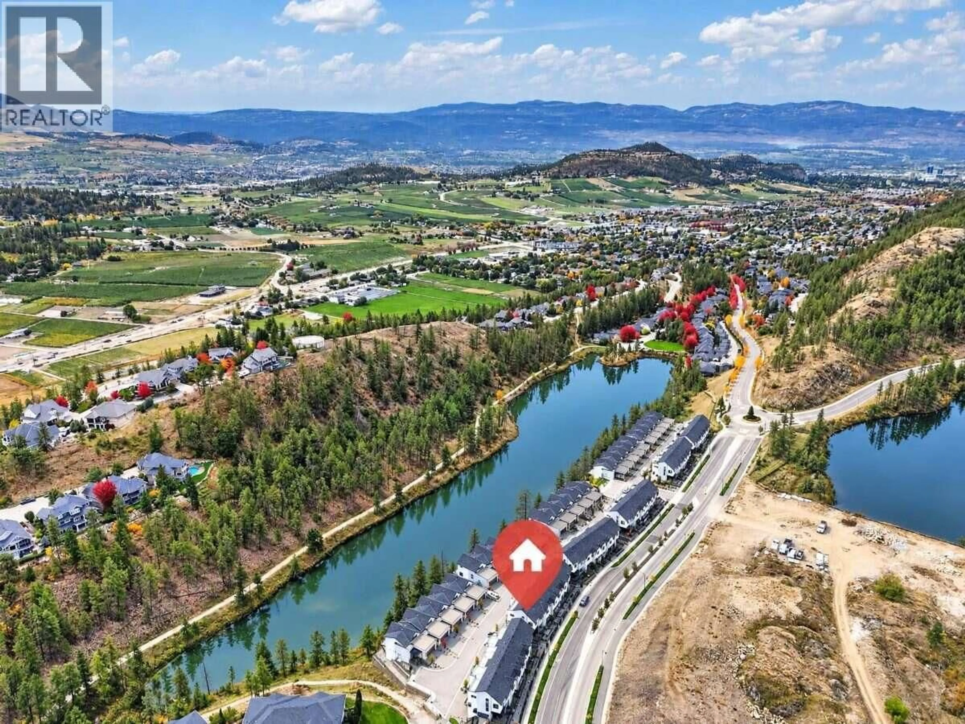 A pic from outside/outdoor area/front of a property/back of a property/a pic from drone, water/lake/river/ocean view for 7 - 1550 UNION ROAD, Kelowna British Columbia V1V0G9