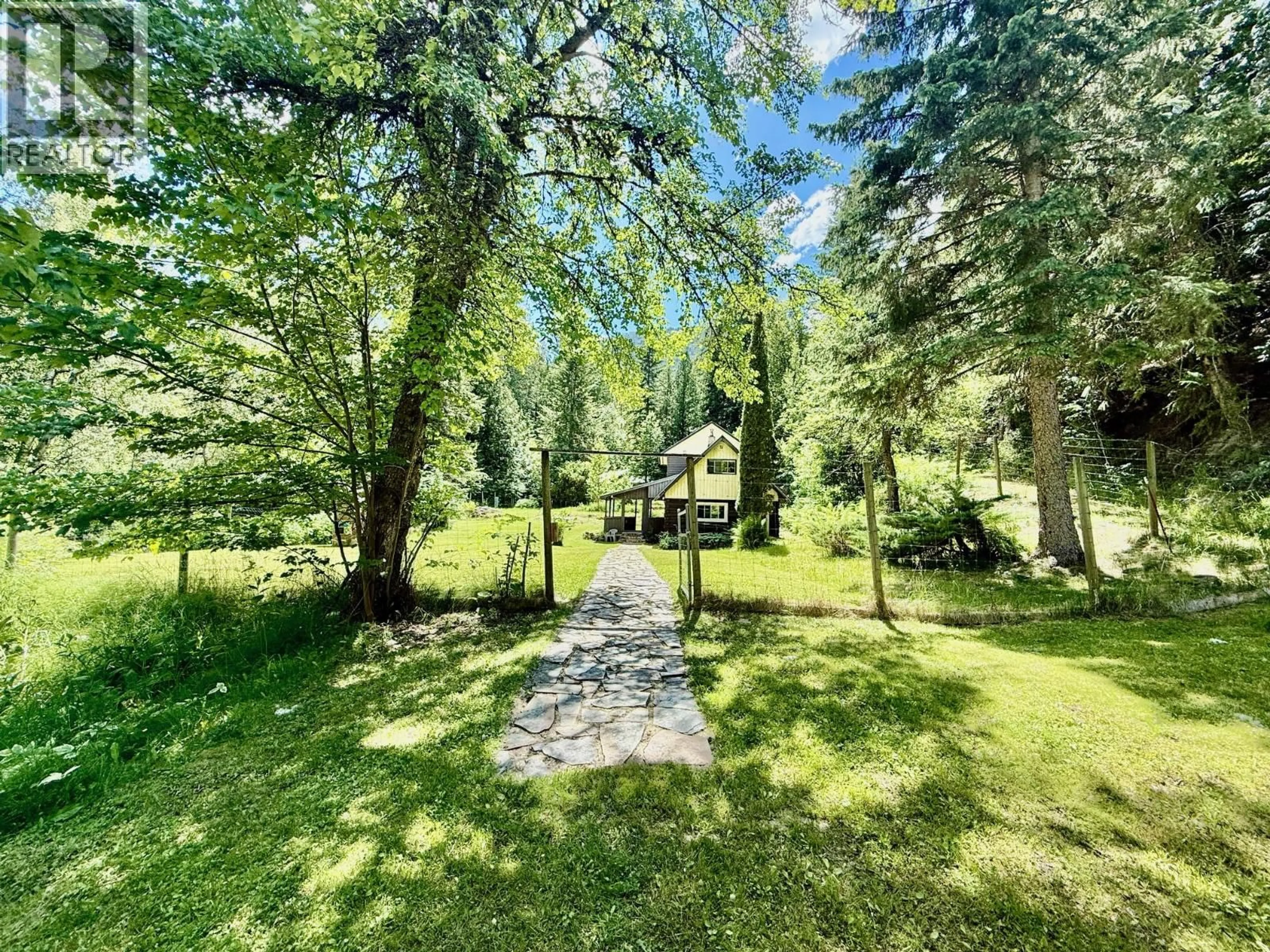 A pic from outside/outdoor area/front of a property/back of a property/a pic from drone, forest/trees view for 4019 SAUNDERS ROAD, Passmore British Columbia V0G2J0