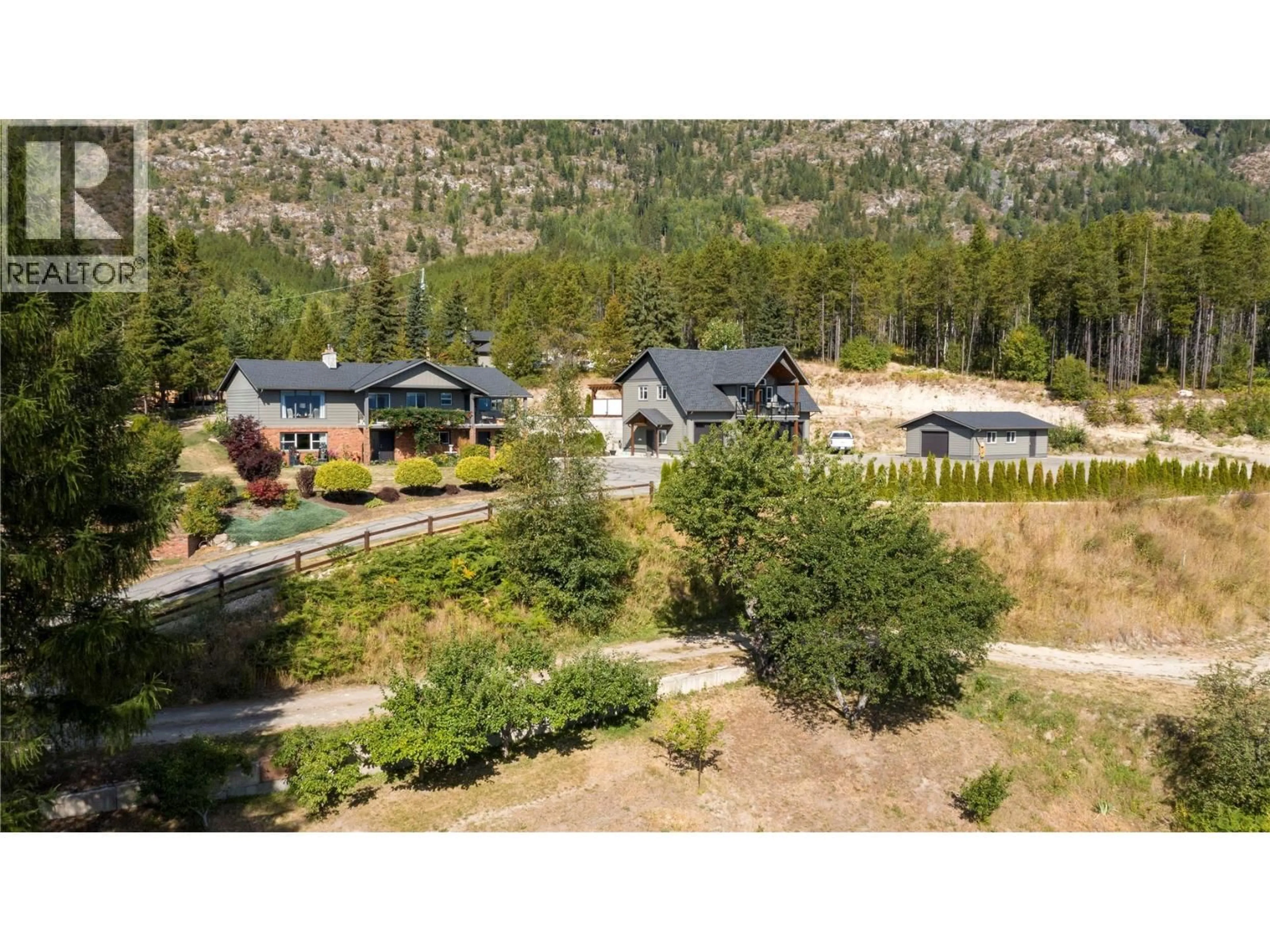 A pic from outside/outdoor area/front of a property/back of a property/a pic from drone, mountain view for 5121 50 STREET NORTHWEST, Salmon Arm British Columbia V1E3A6