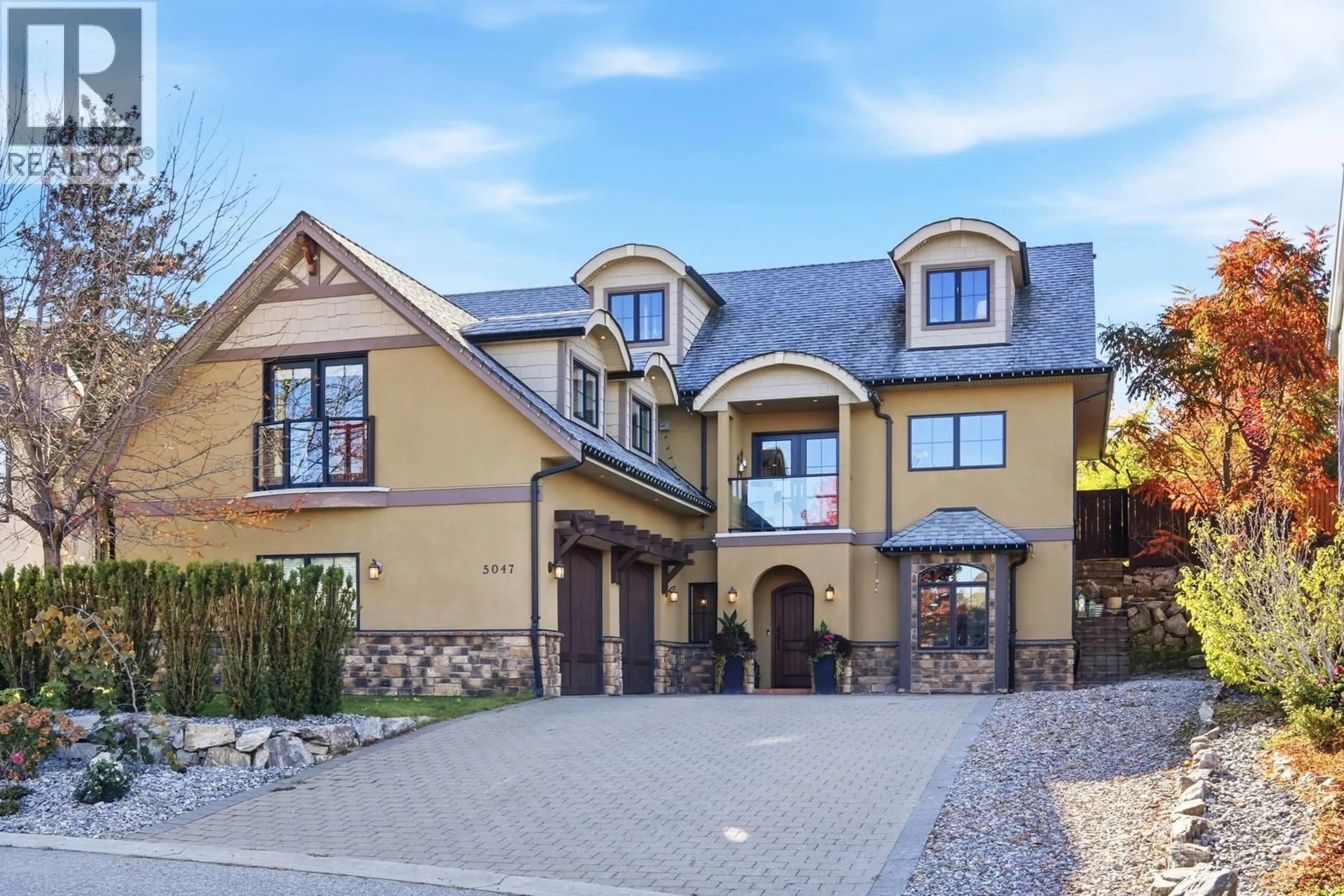 Home with brick exterior material, street for 5047 SEON CRESCENT, Kelowna British Columbia V1W5A5