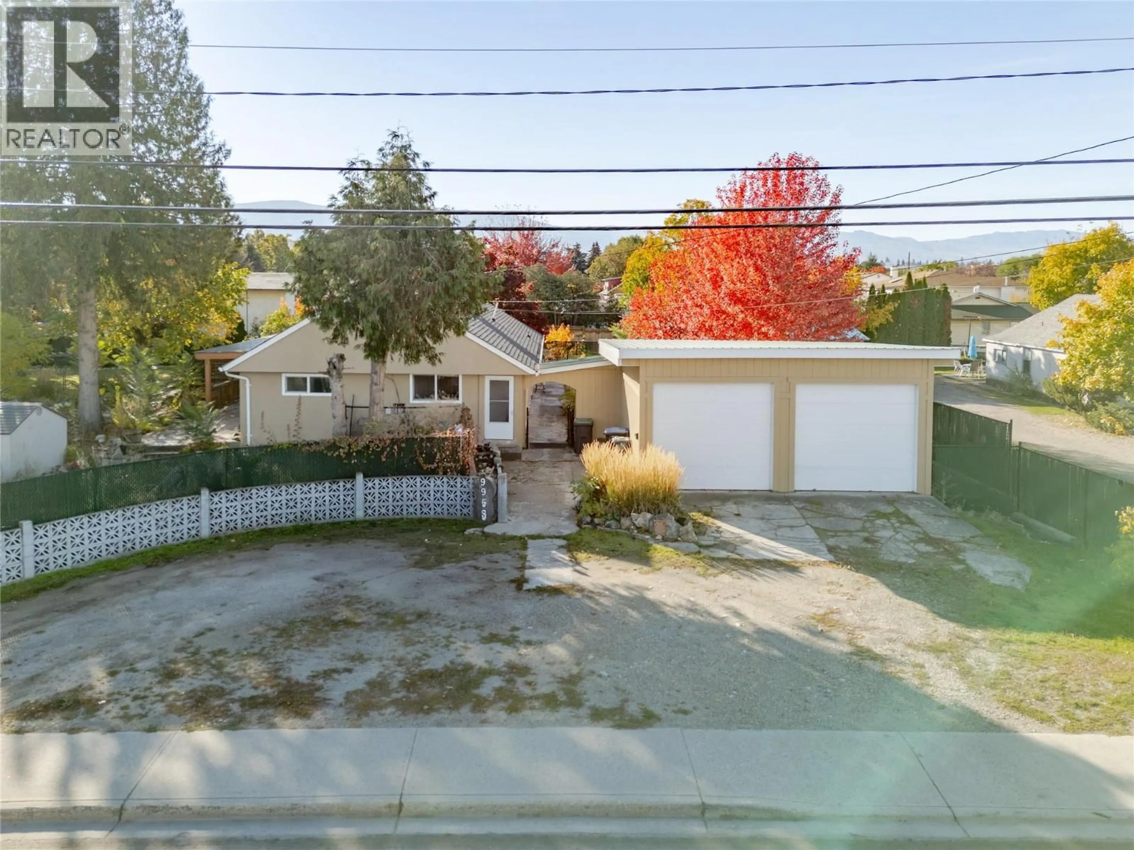 A pic from outside/outdoor area/front of a property/back of a property/a pic from drone, street for 995 LEATHEAD ROAD, Kelowna British Columbia V1X2J9