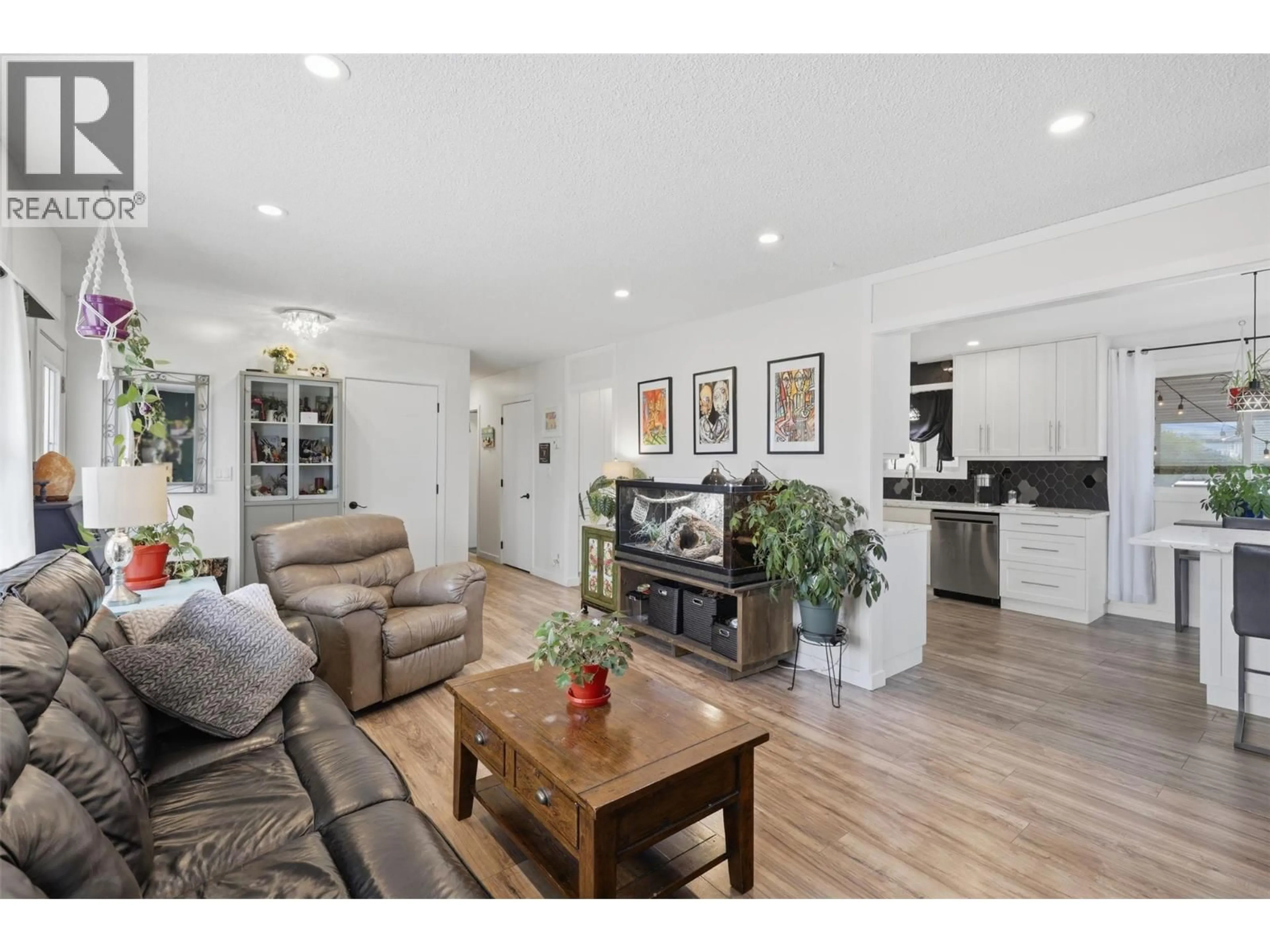 Open concept kitchen, wood/laminate floor for 1239 10TH STREET, Kamloops British Columbia V2B3A9