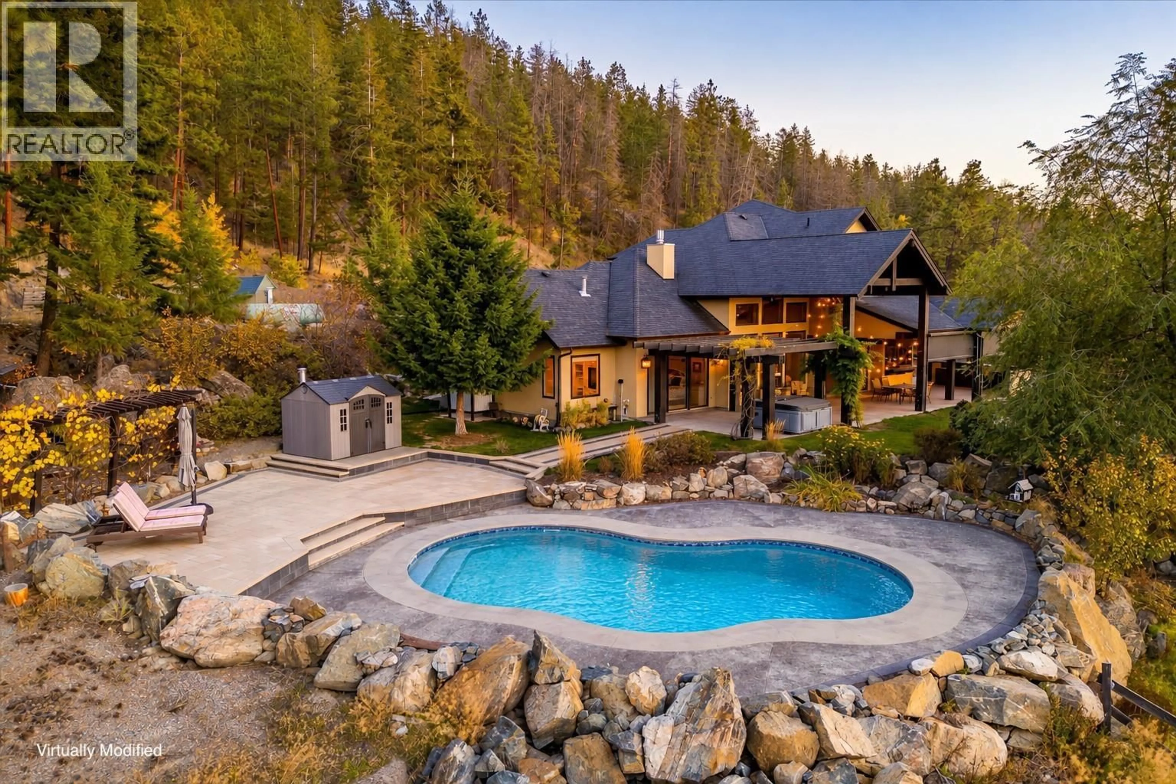 A pic from outside/outdoor area/front of a property/back of a property/a pic from drone, water/lake/river/ocean view for 5500 ROCKFACE ROAD, Kelowna British Columbia V1X7V7