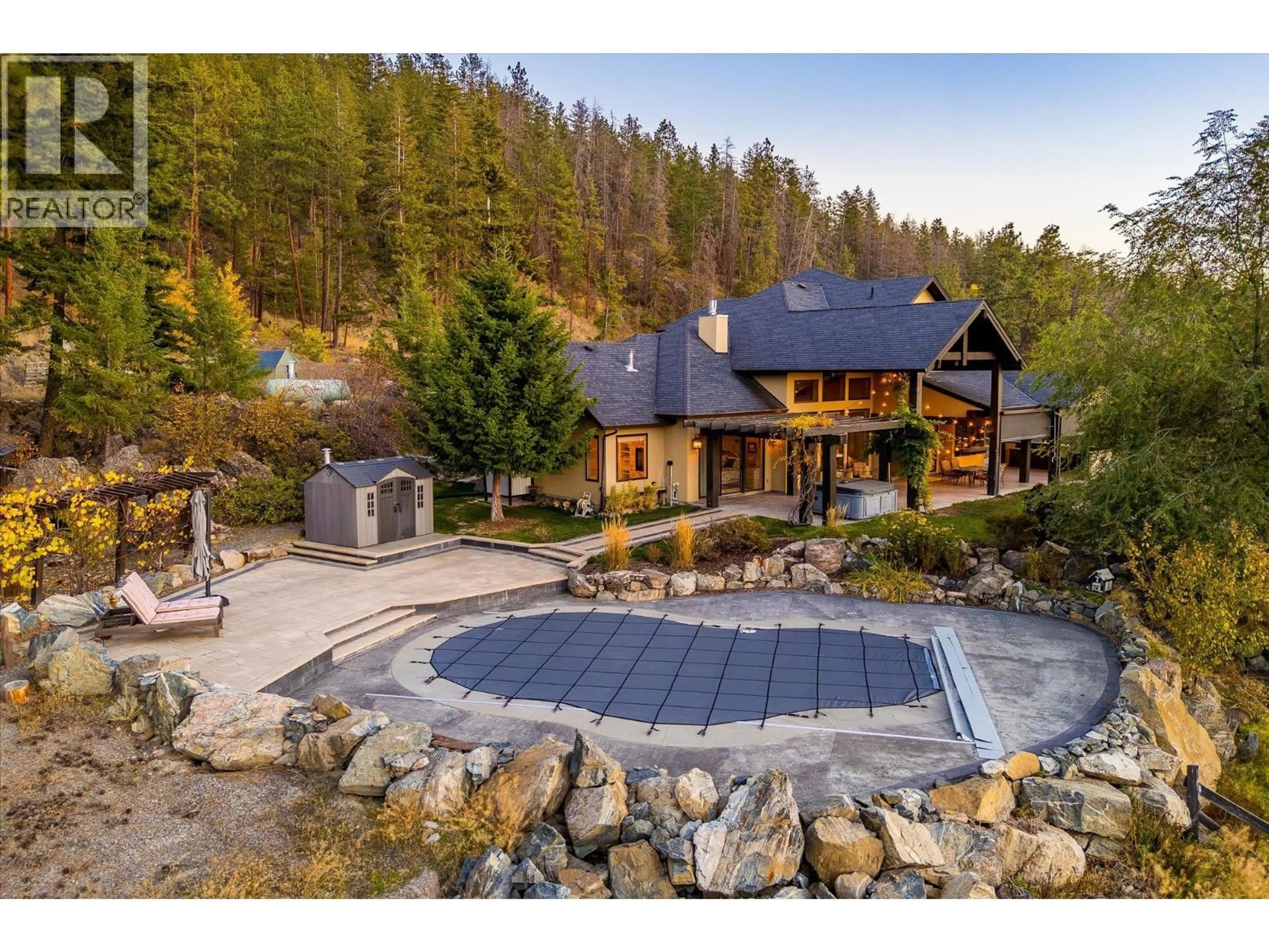 A pic from outside/outdoor area/front of a property/back of a property/a pic from drone, mountain view for 5500 ROCKFACE ROAD, Kelowna British Columbia V1X7V7